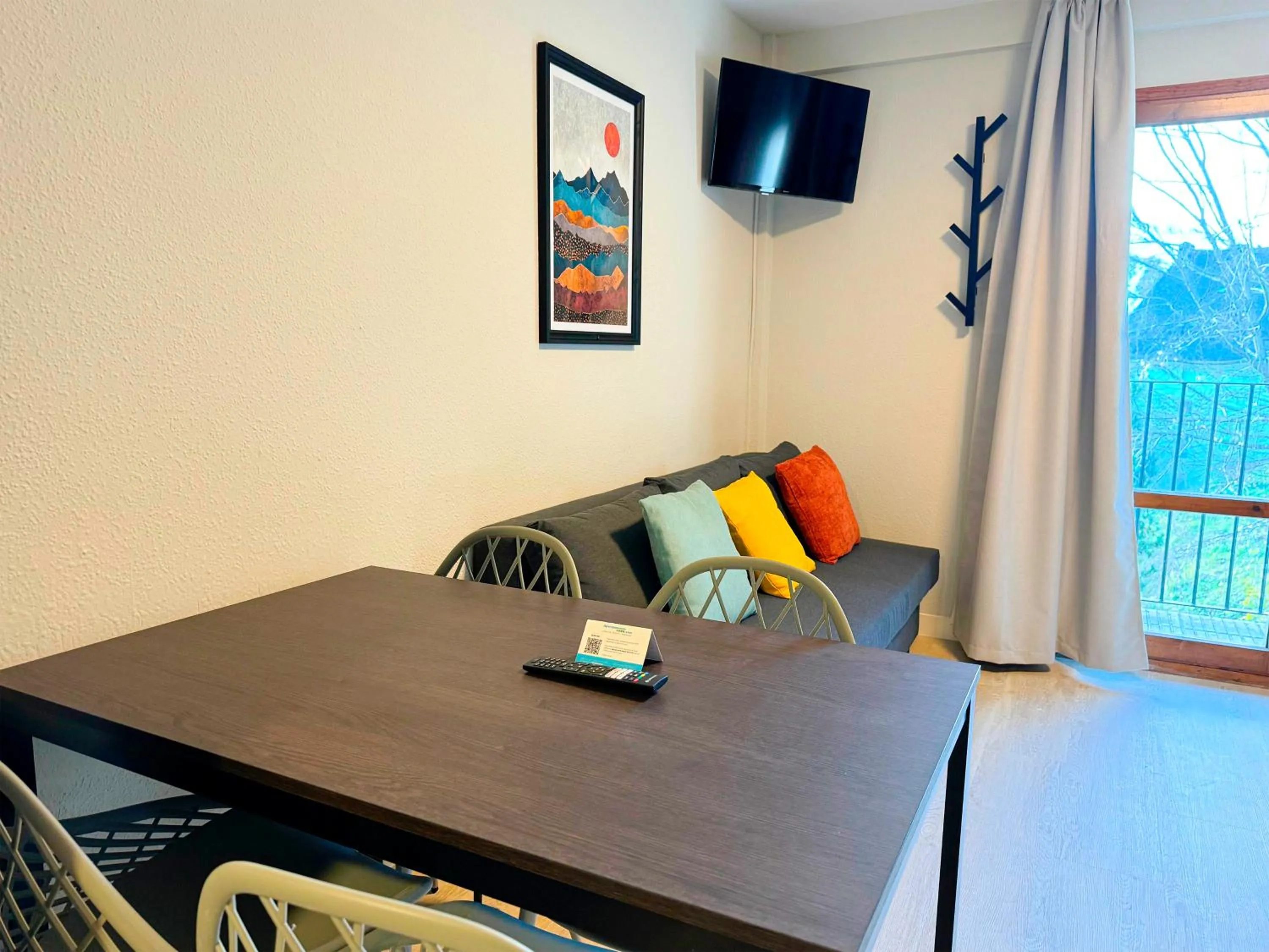 TV and multimedia in Apartamentos Midi 3000