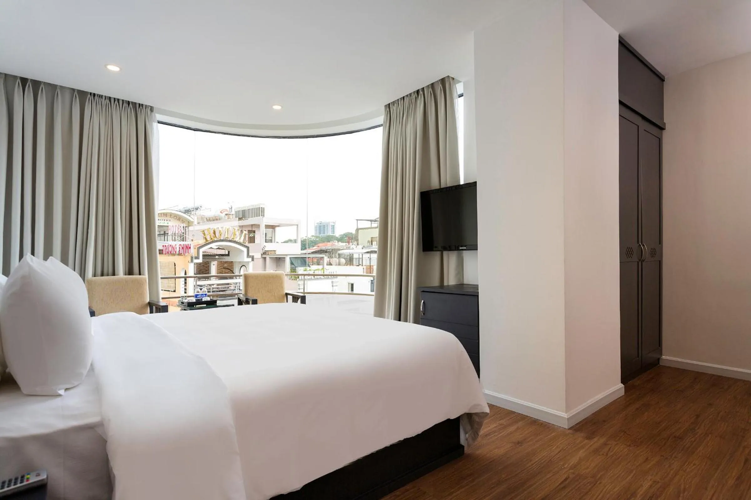 Photo of the whole room, Bed in Calista Sai Gon Hotel