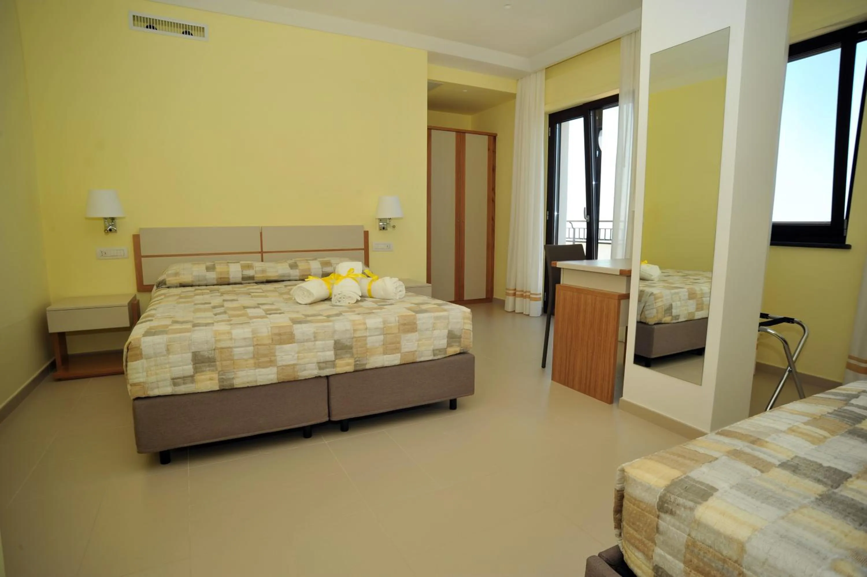 Bed in Villa Paradise Resort