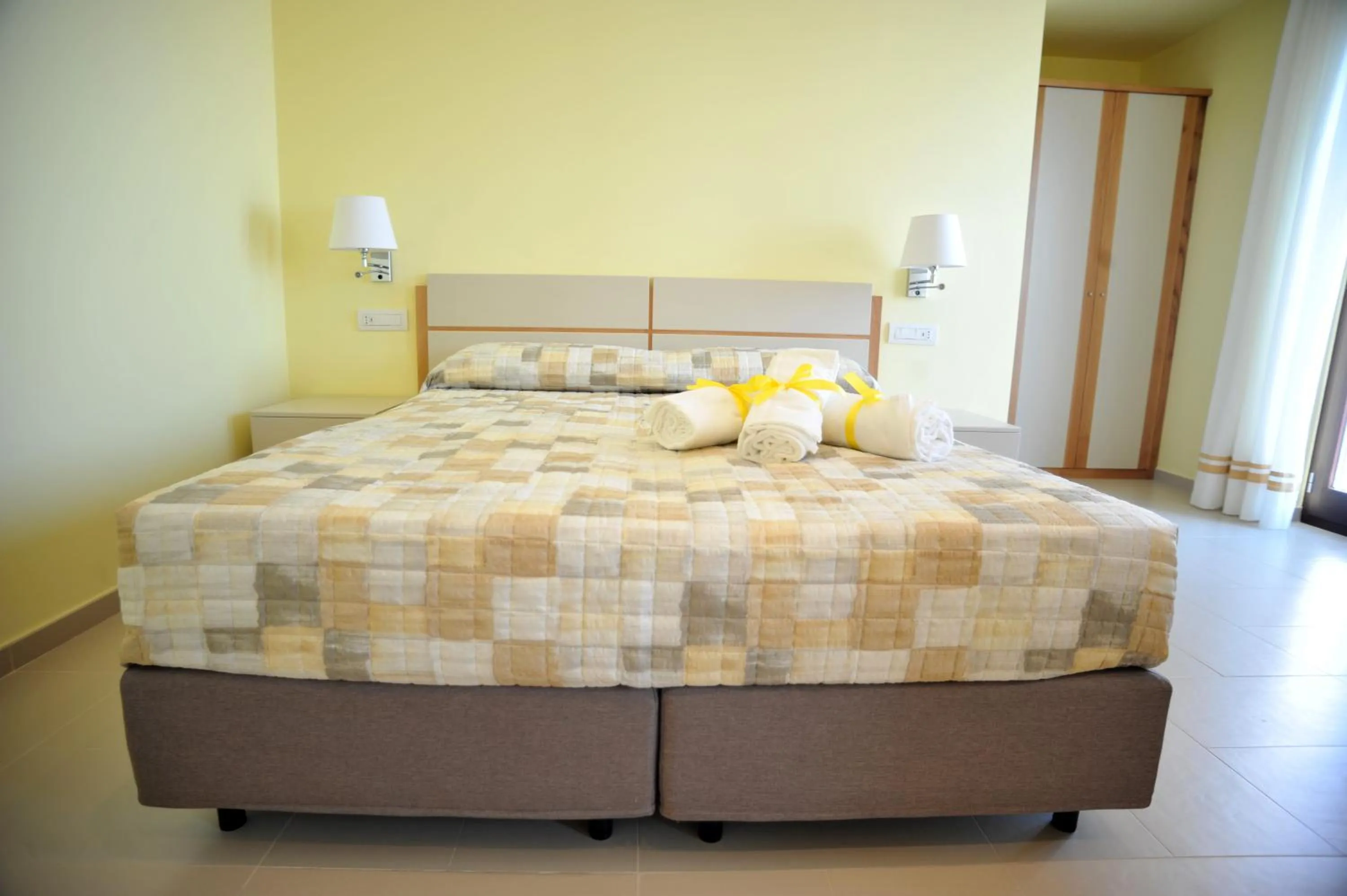 Bed in Villa Paradise Resort