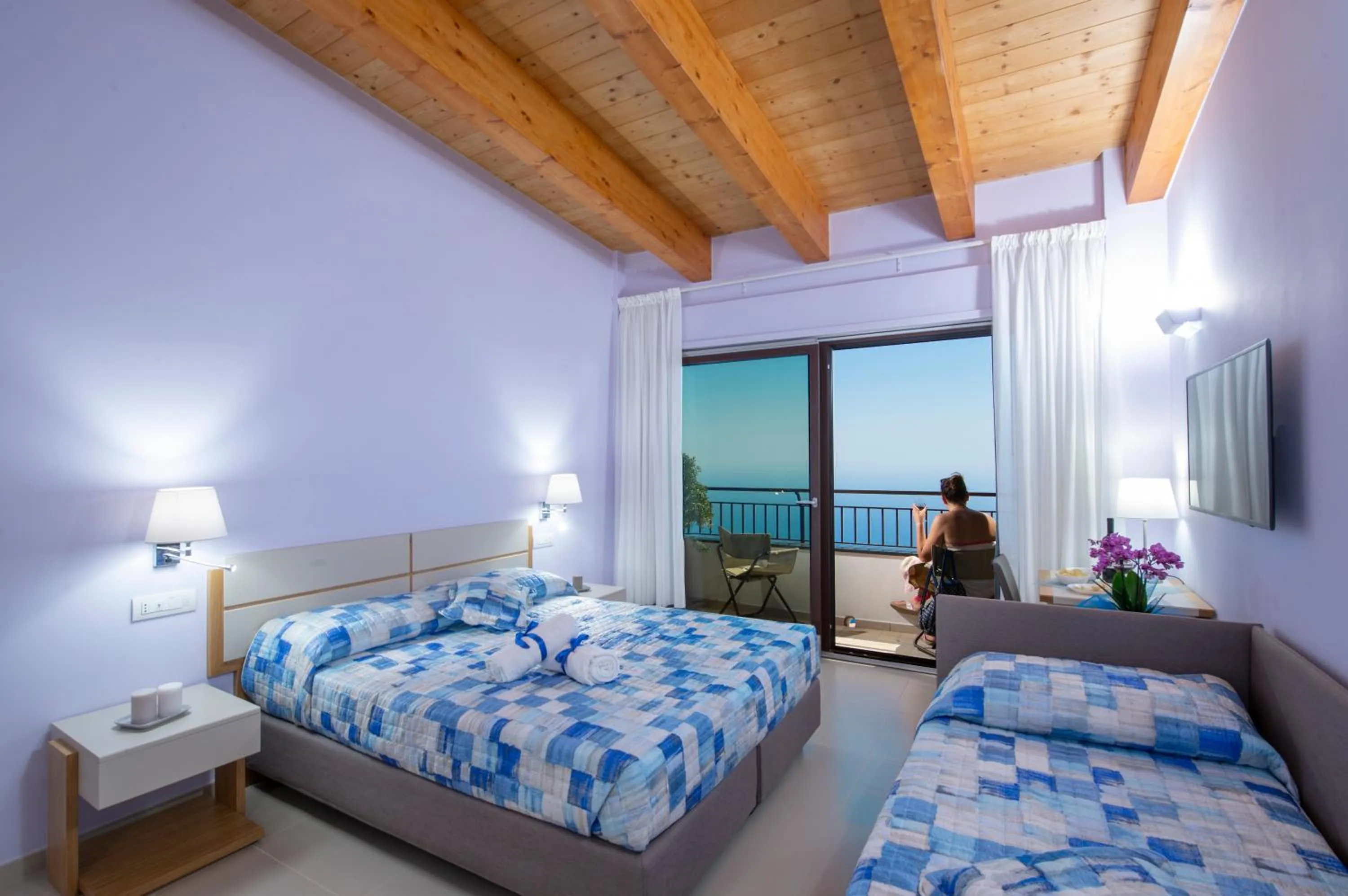 Bed in Villa Paradise Resort