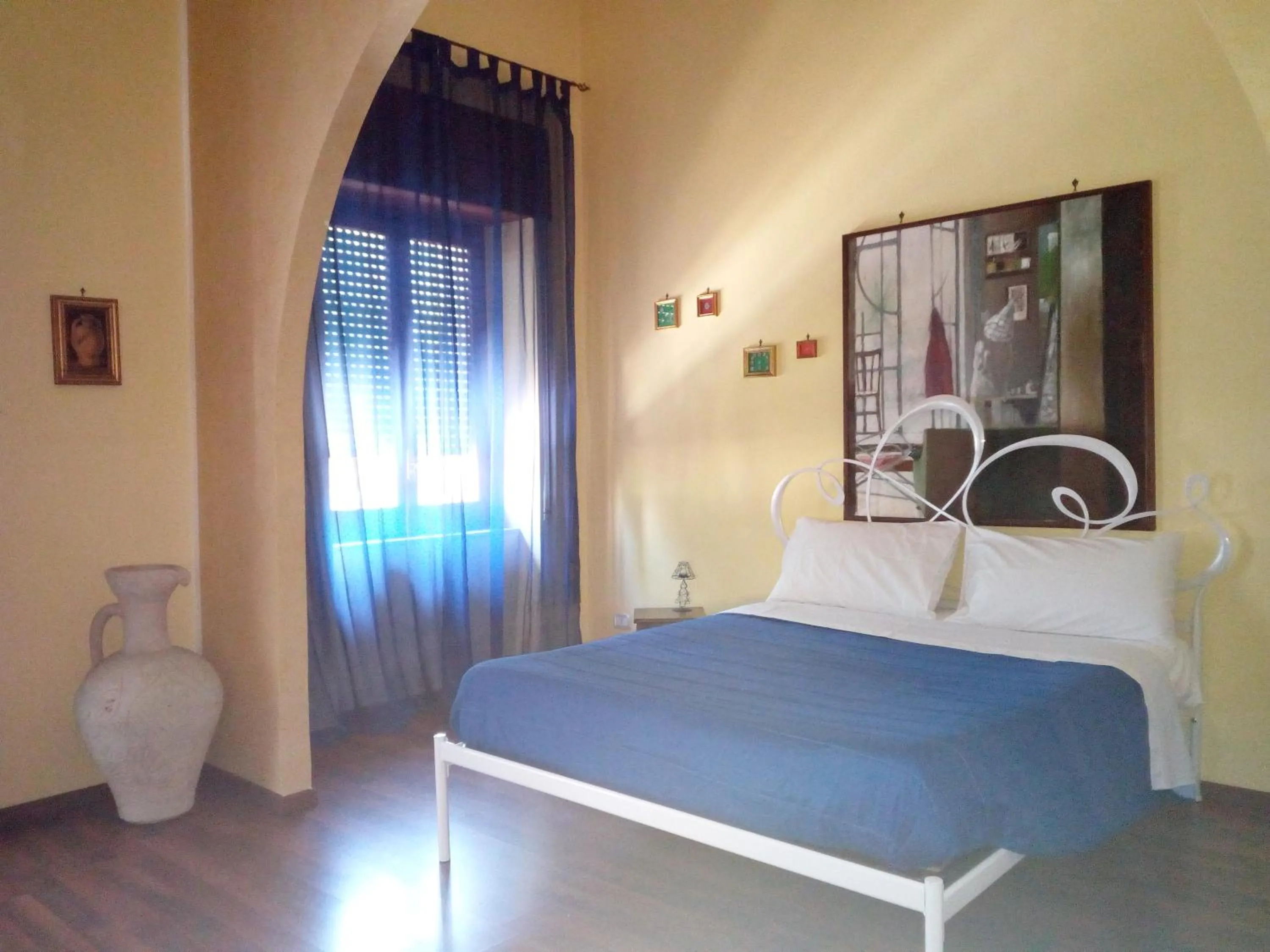 Bed in La Suite Sul Corso