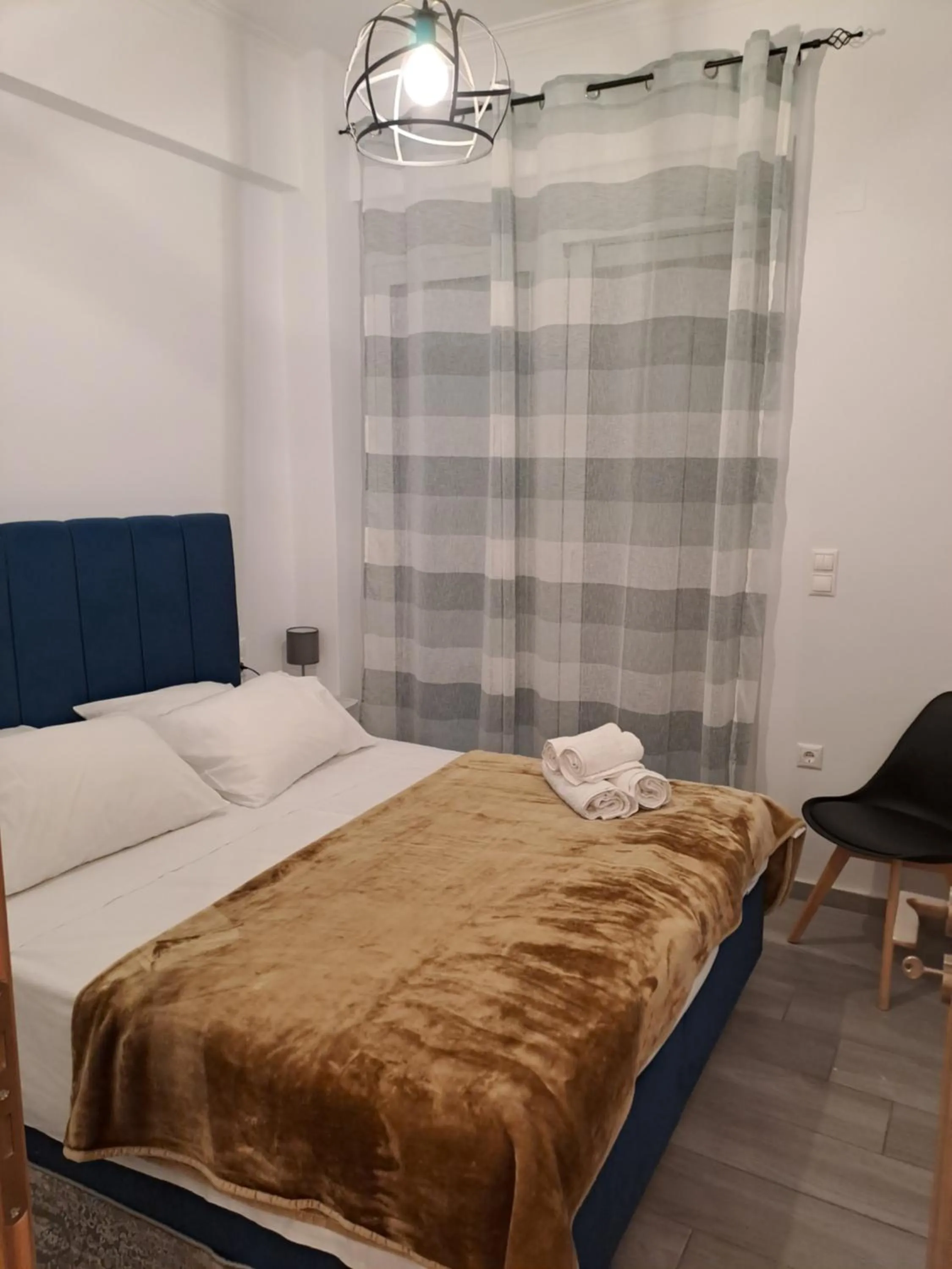 Bed in Parthenon Hotel