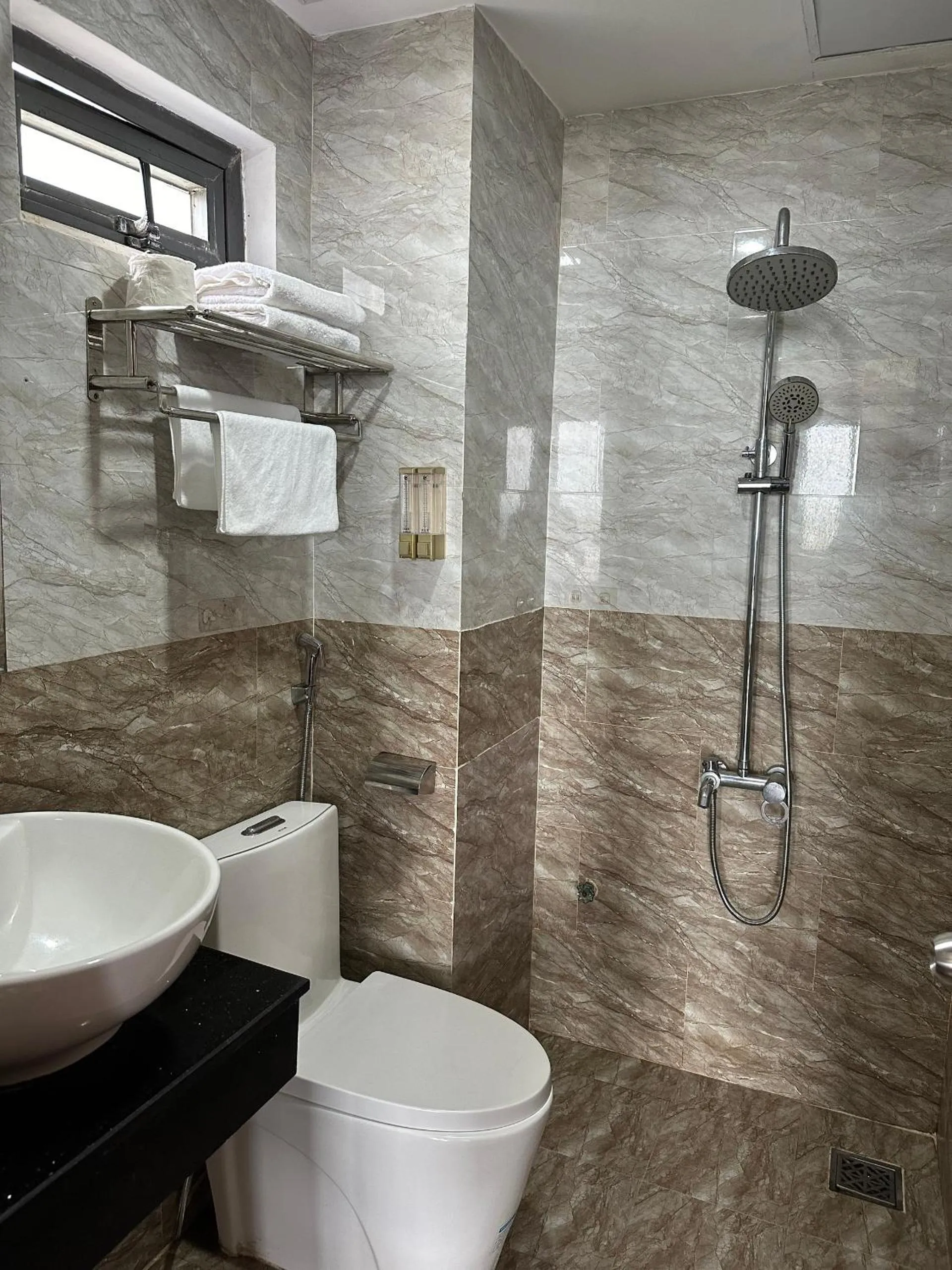 Bathroom in New Era Hotel & Apartments