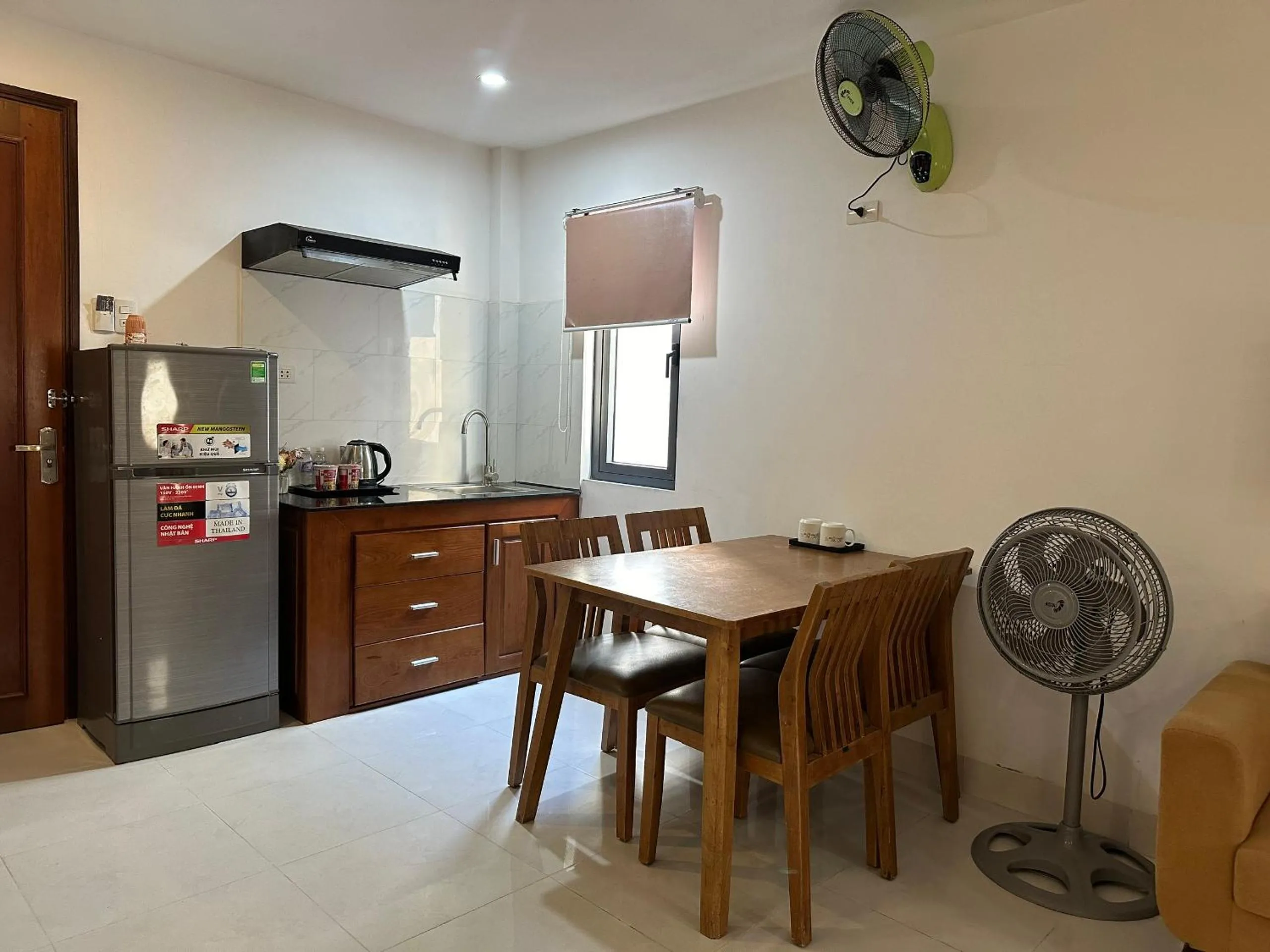 Living room in New Era Hotel & Apartments