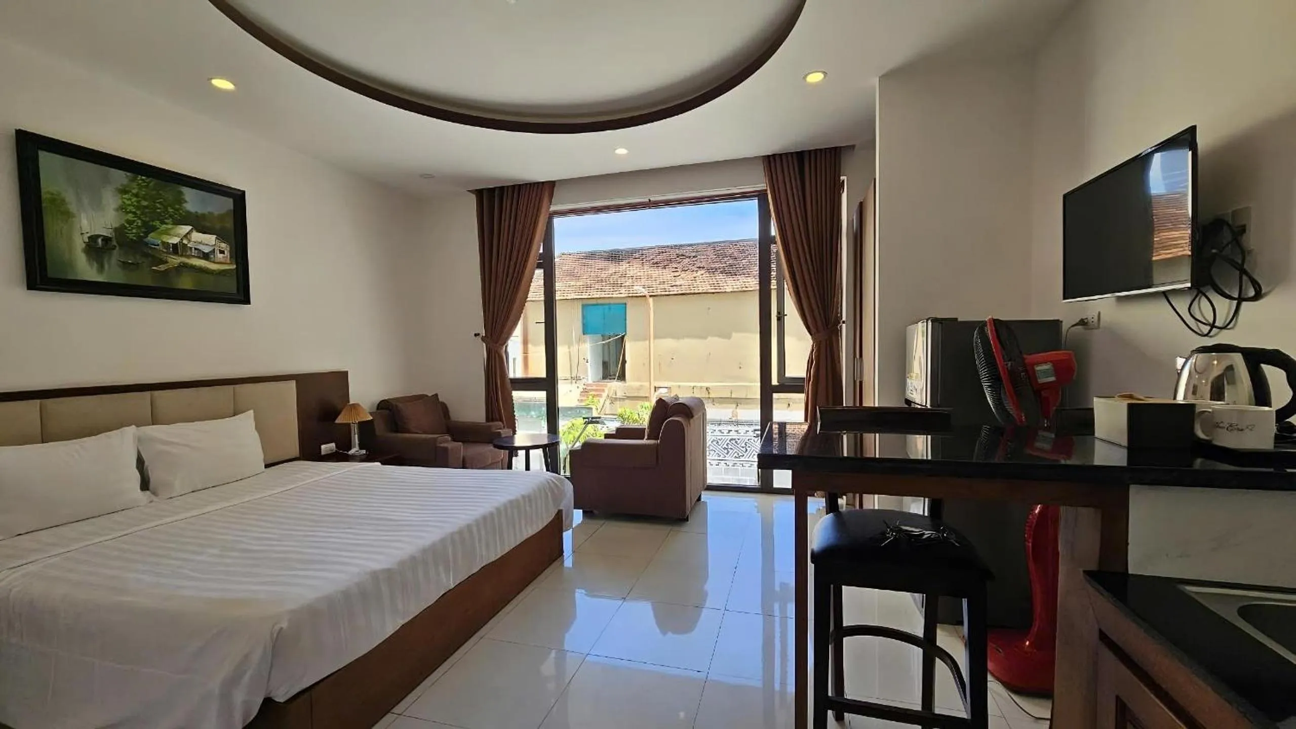 Bed in New Era Hotel & Apartments