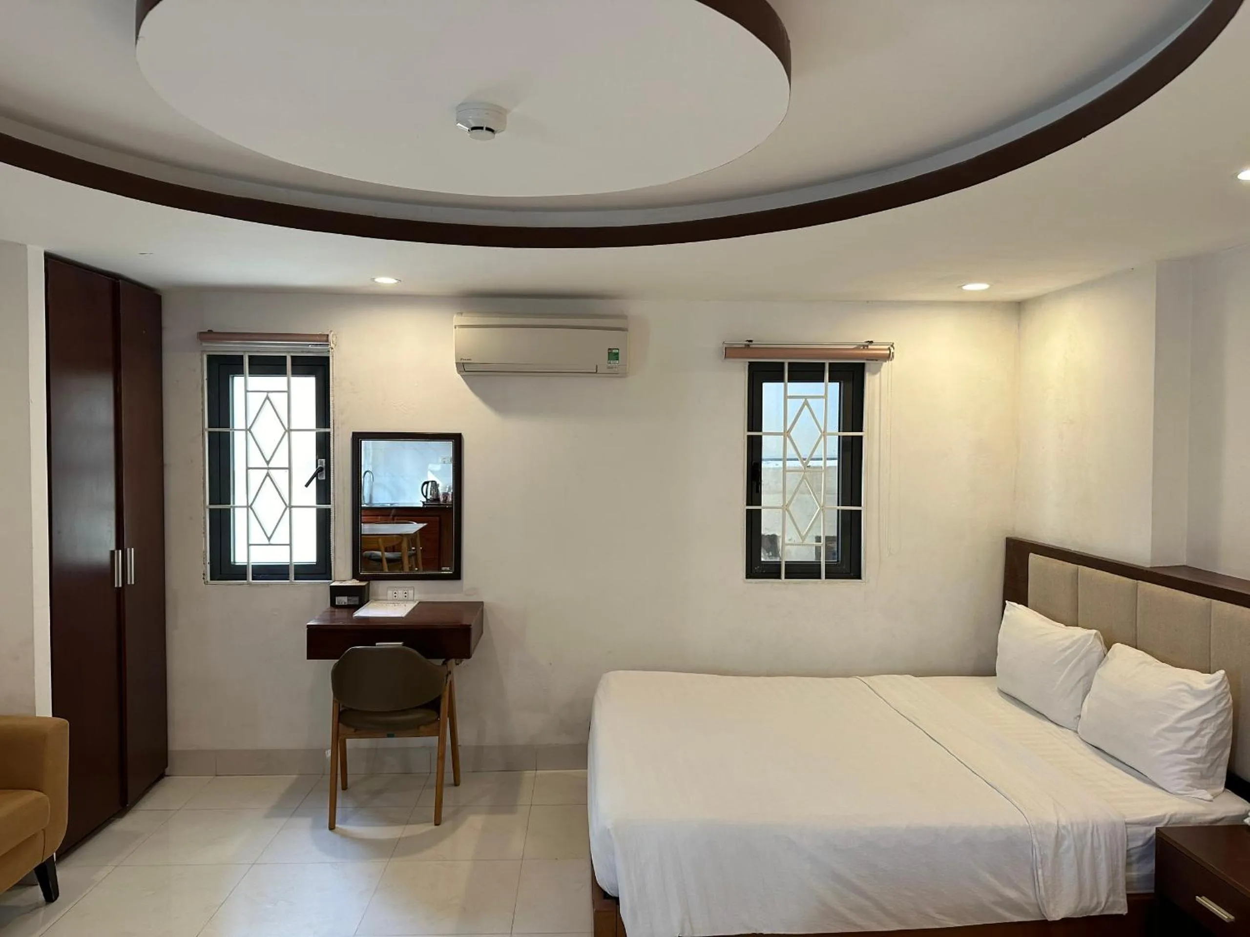 Bed in New Era Hotel & Apartments