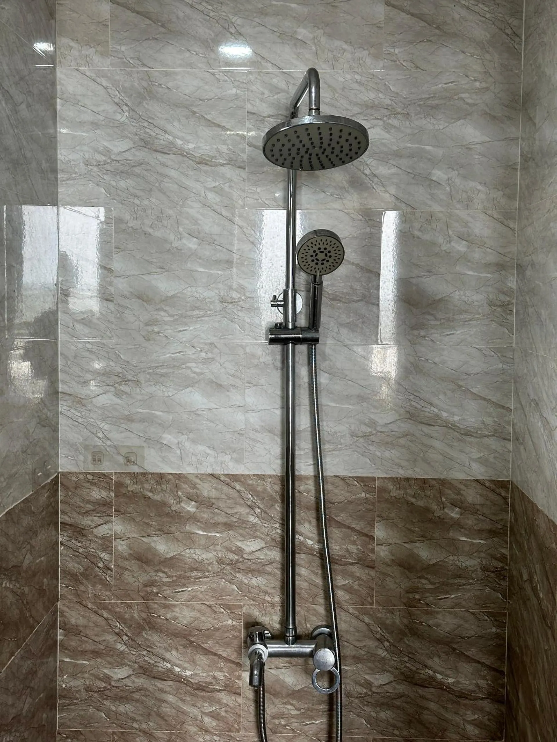 Shower in New Era Hotel & Apartments