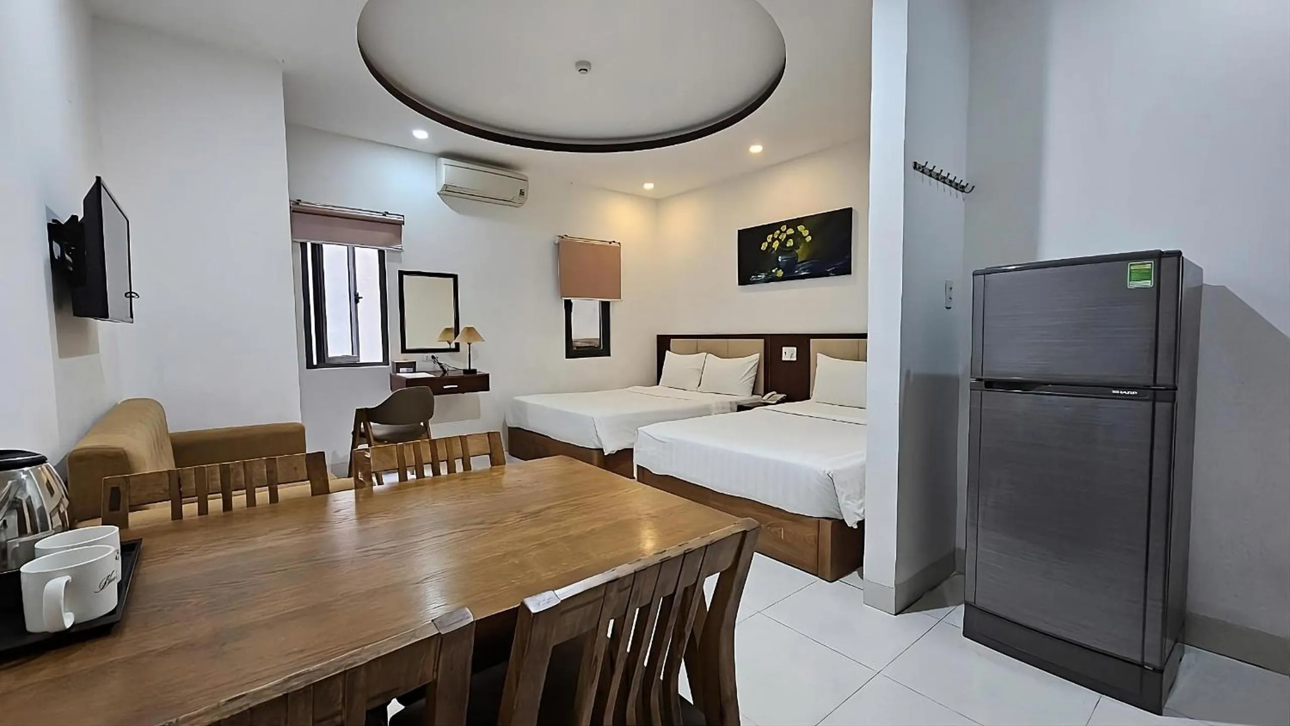 Bed in New Era Hotel & Apartments