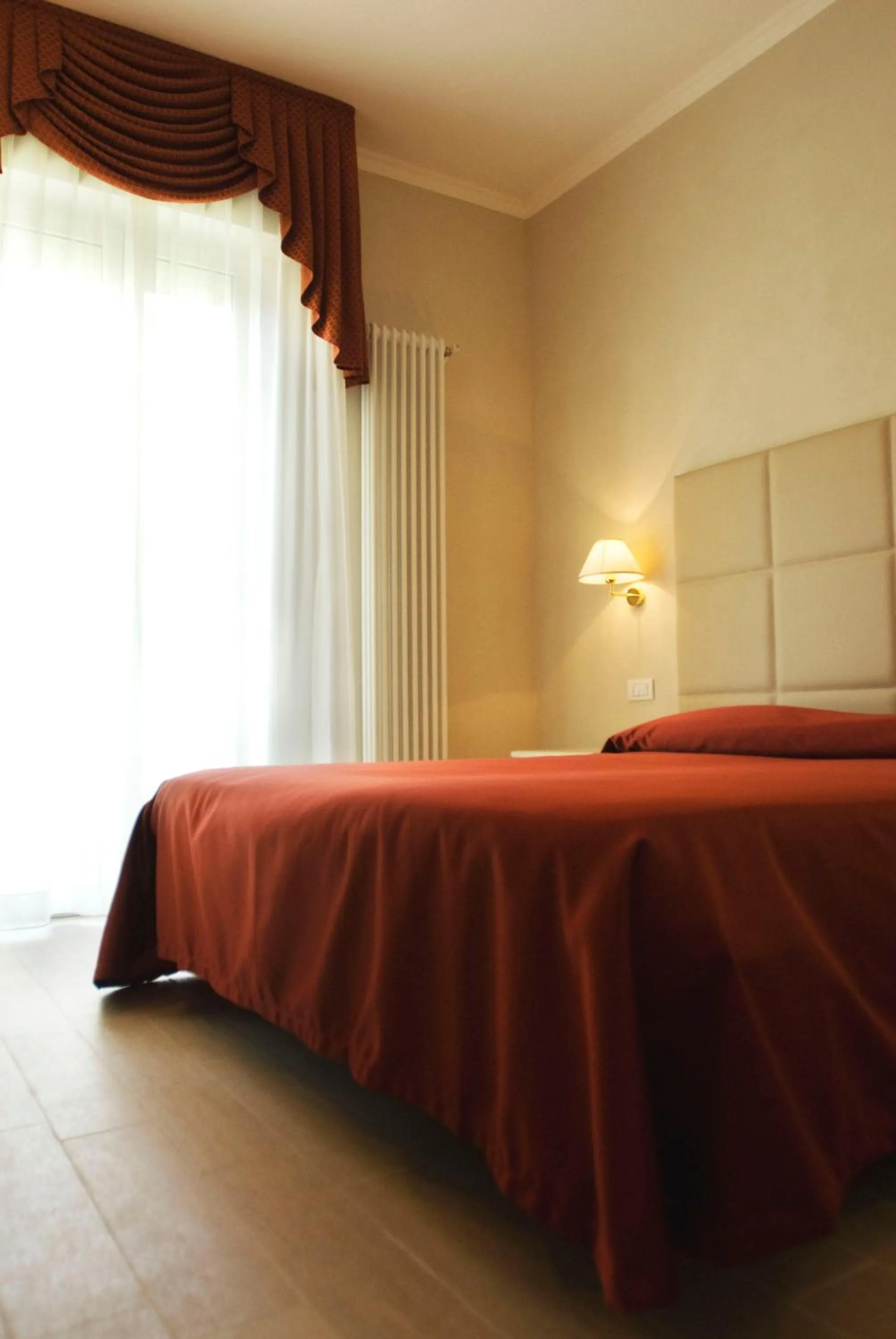 Bed in Hotel Gradara