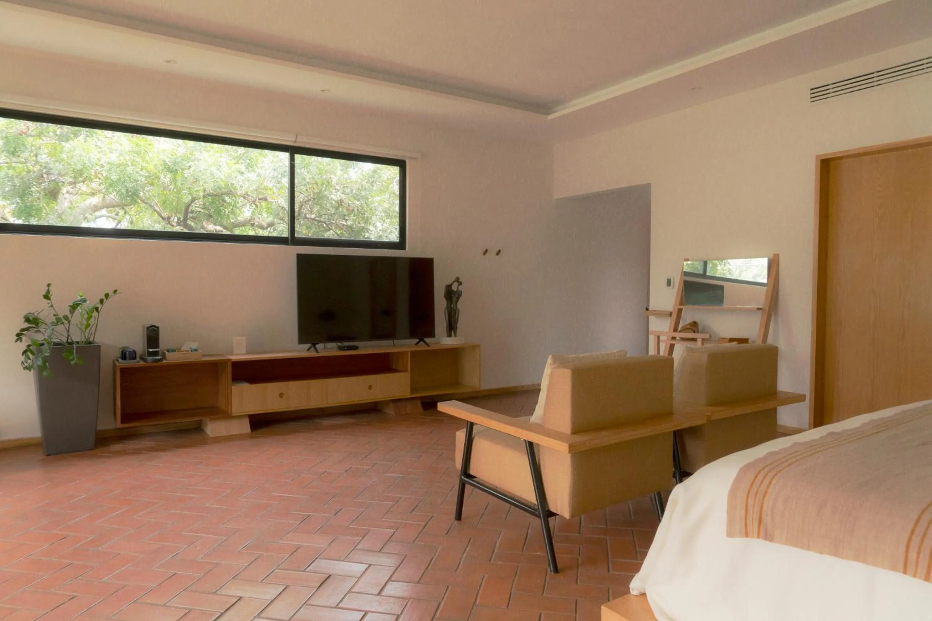 Communal lounge/ TV room, Bed in Hotel Boutique Casa Fernanda