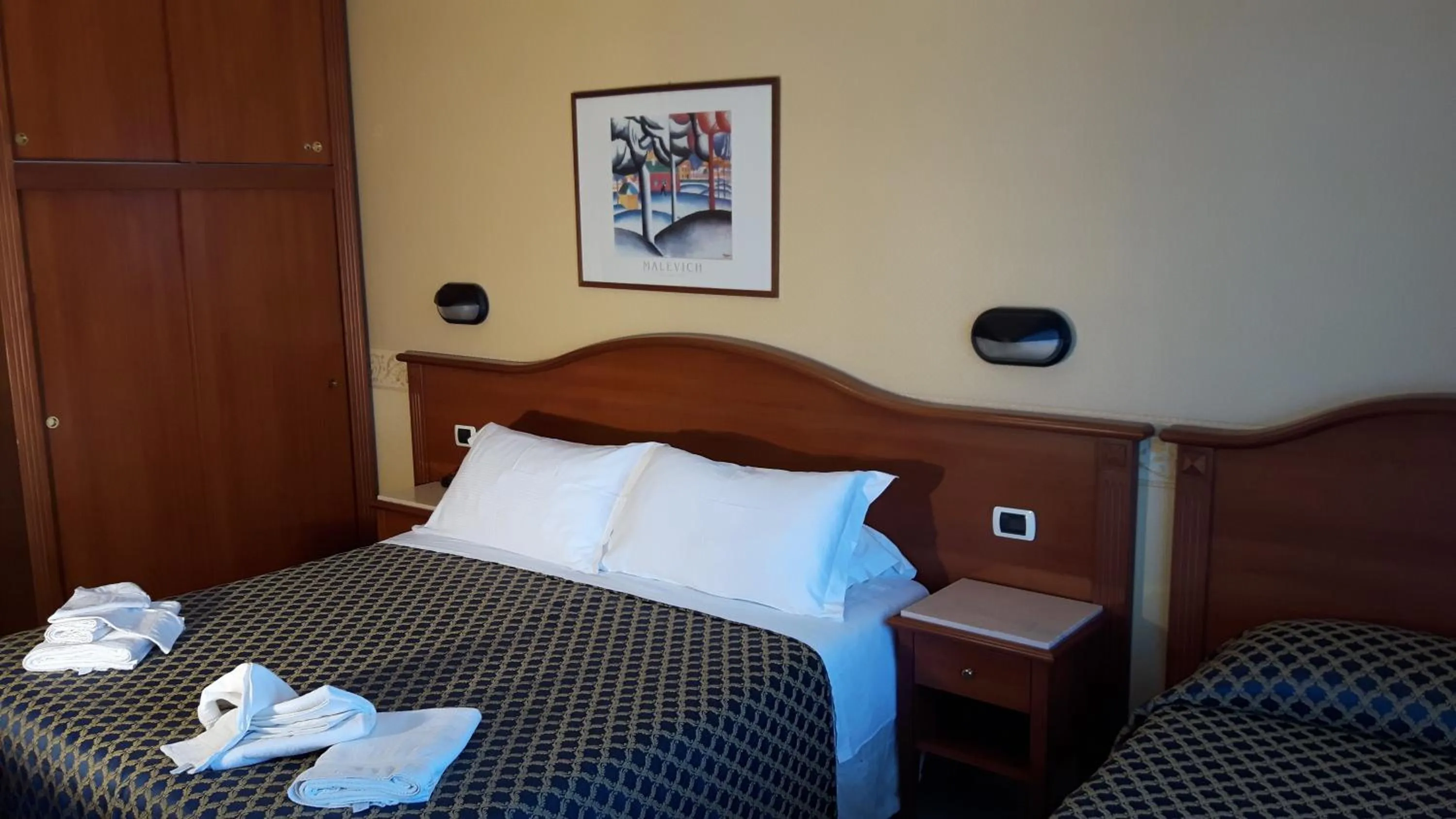 Bed in Hotel Grifone