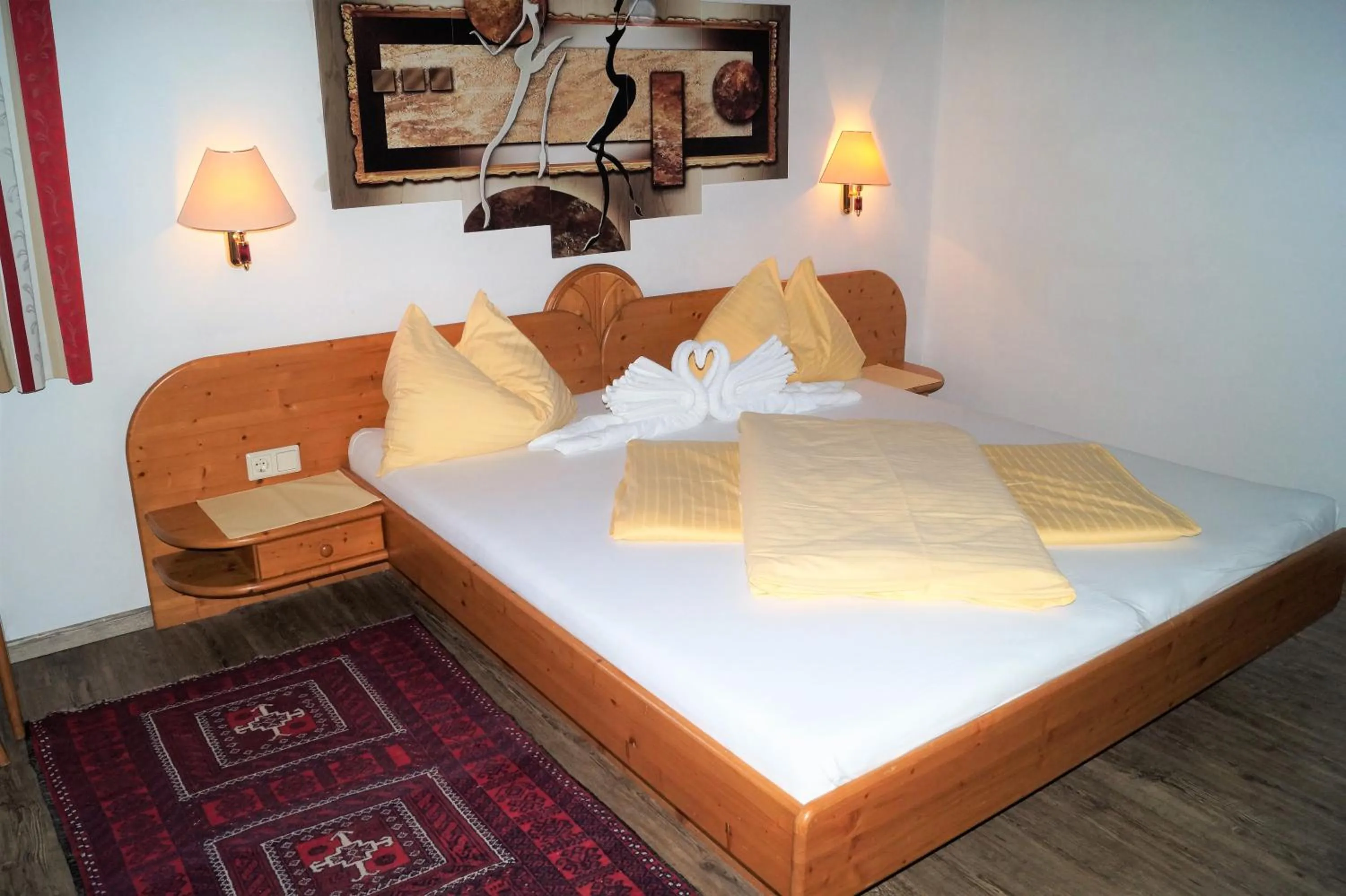 Bed in Sieglhub Chalets - Appartements - Hotel