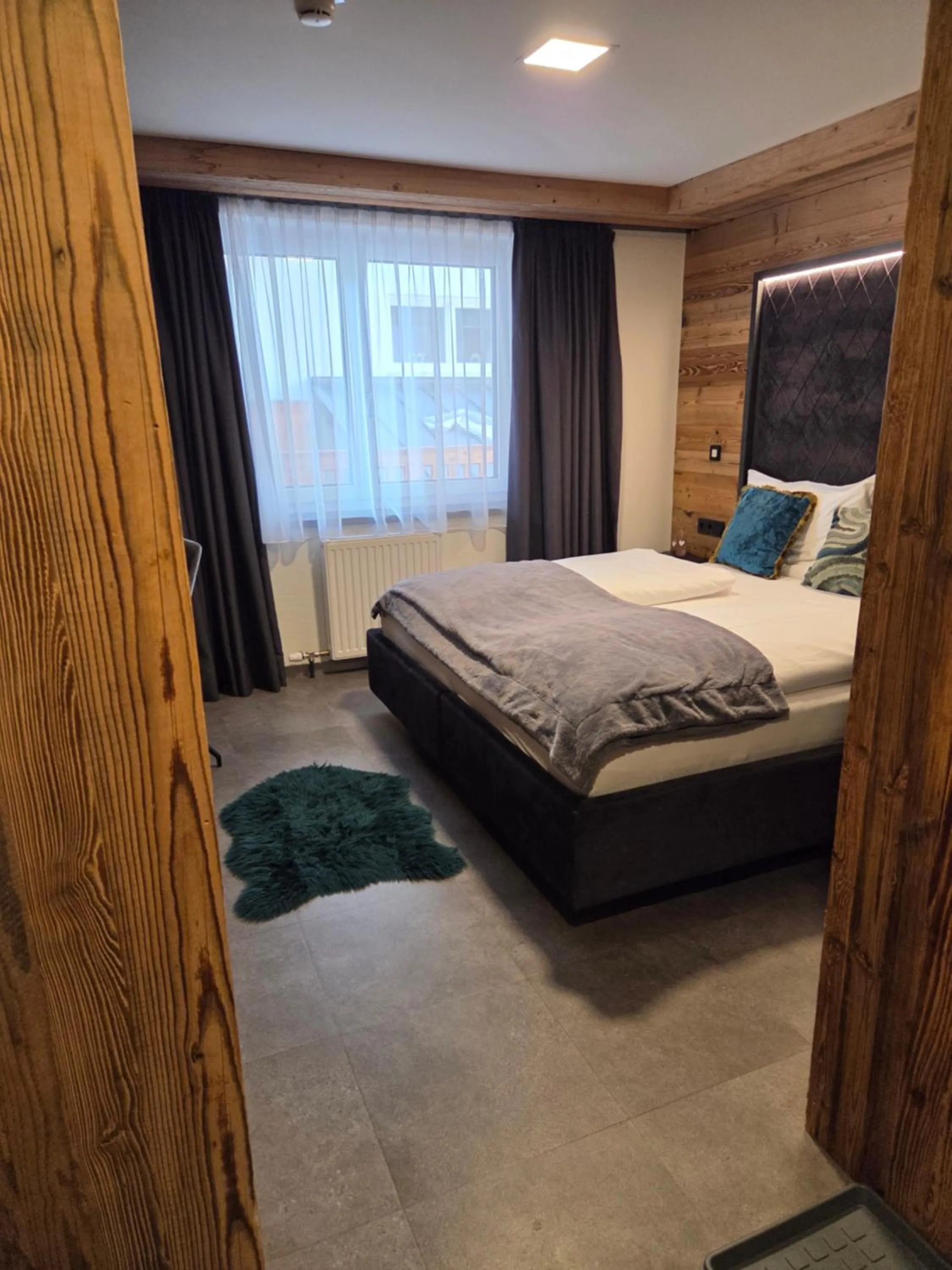 Bed in Sieglhub Chalets - Appartements - Hotel