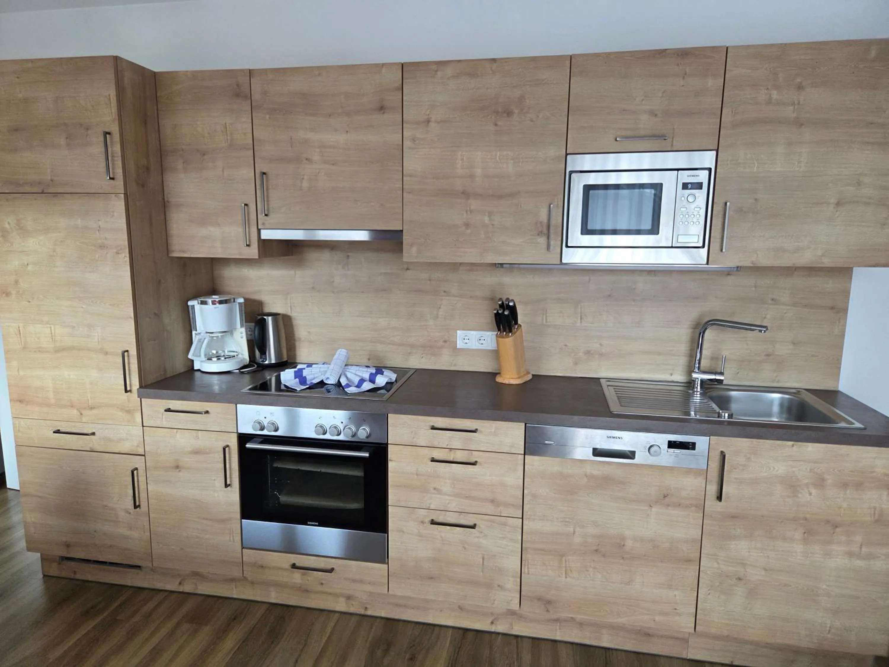 Kitchen or kitchenette in Sieglhub Chalets - Appartements - Hotel