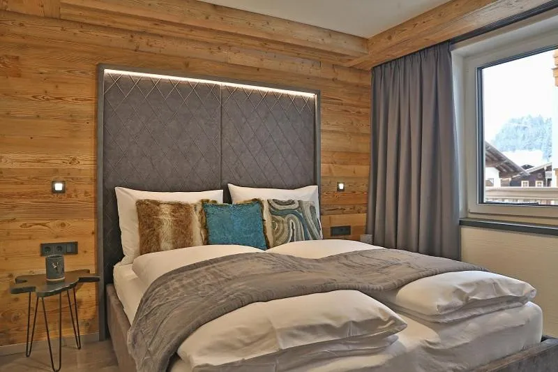Bed in Sieglhub Chalets - Appartements - Hotel
