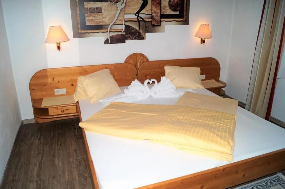 Bed in Sieglhub Chalets - Appartements - Hotel
