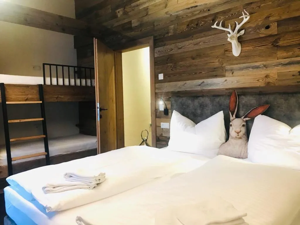 Bed in Sieglhub Chalets - Appartements - Hotel