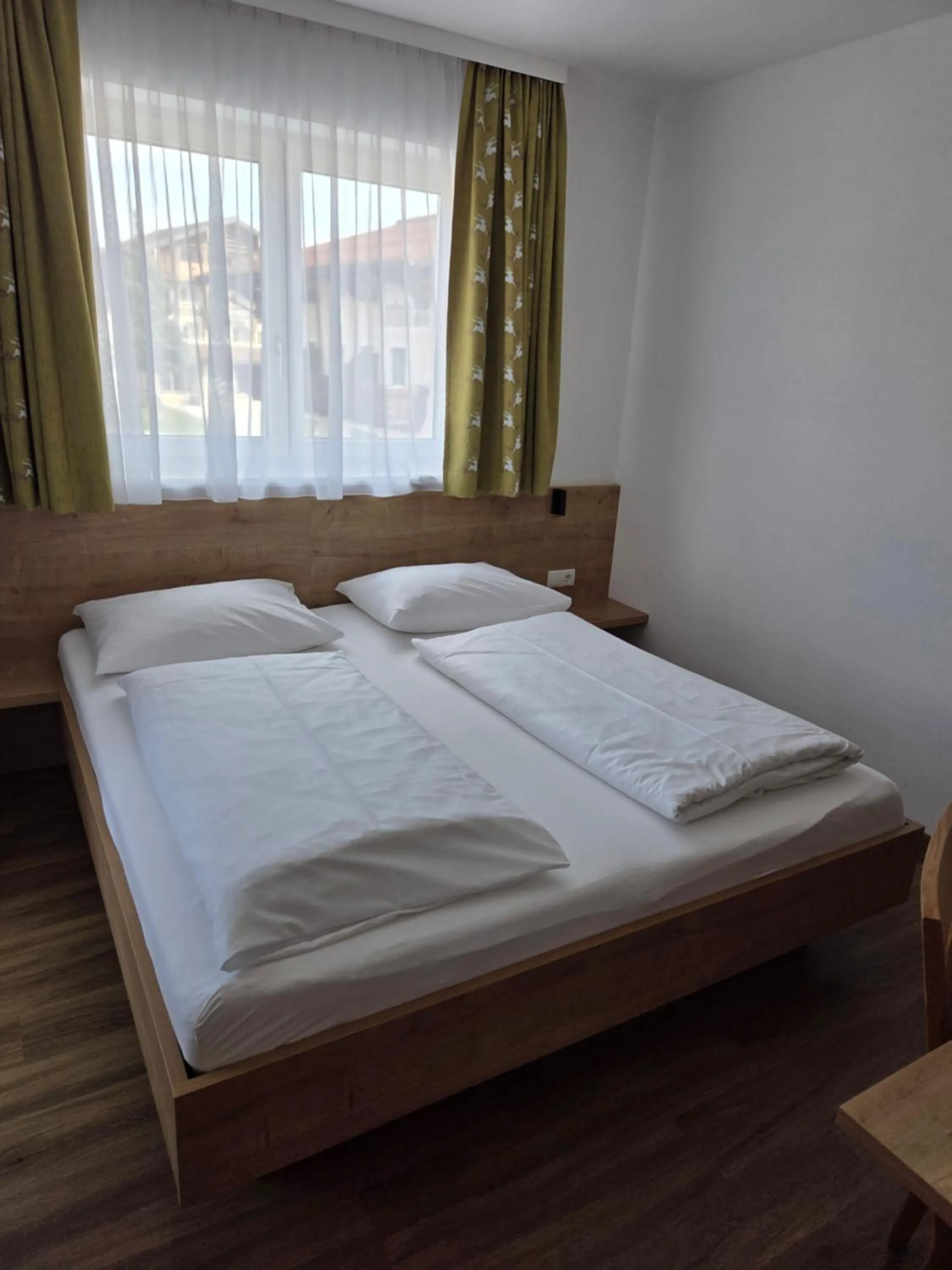 Bedroom, Bed in Sieglhub Chalets - Appartements - Hotel