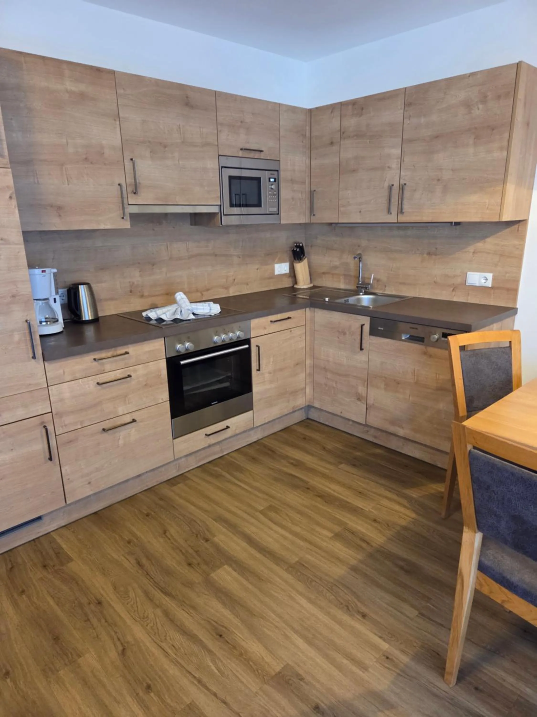 Kitchen or kitchenette in Sieglhub Chalets - Appartements - Hotel