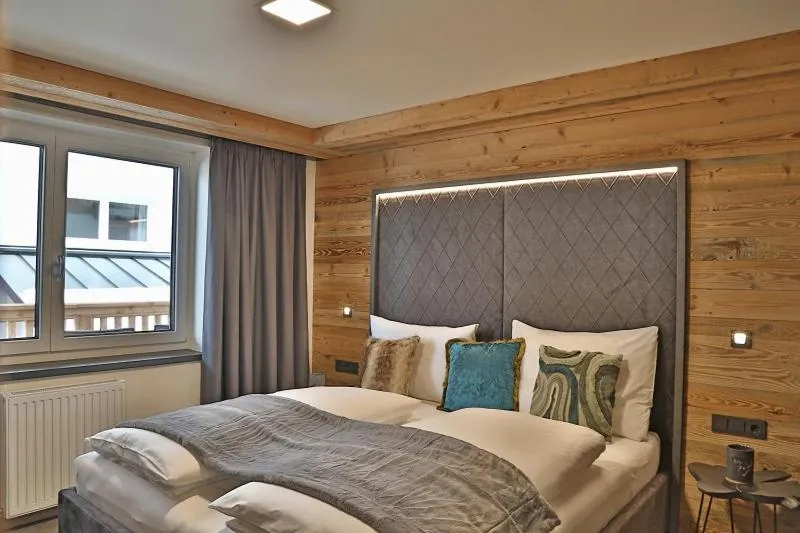 Bed in Sieglhub Chalets - Appartements - Hotel