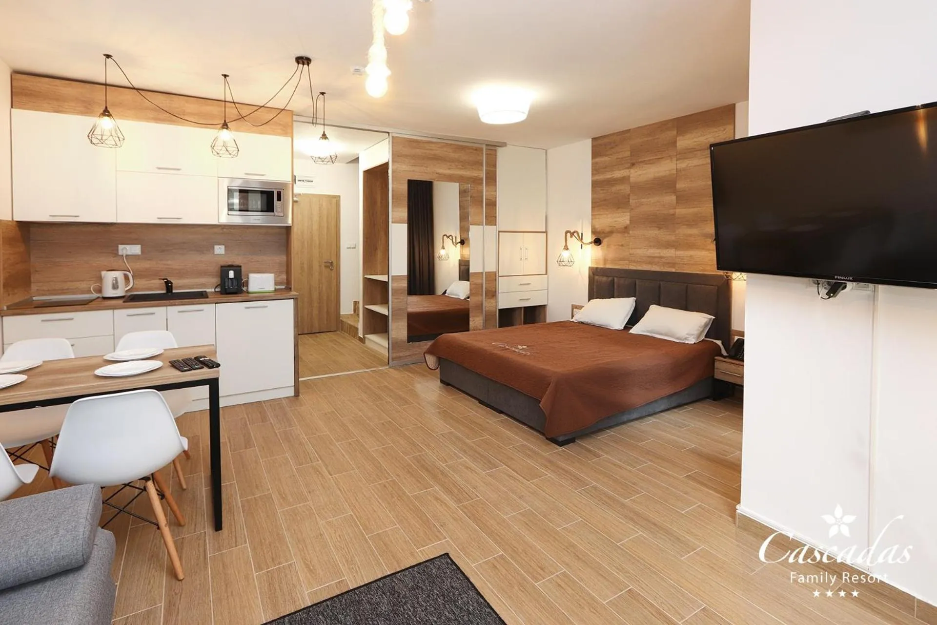 Living room, Bed in Cascadas Family Resort