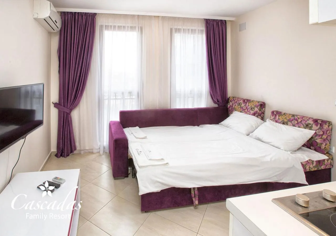 Bed in Cascadas Family Resort