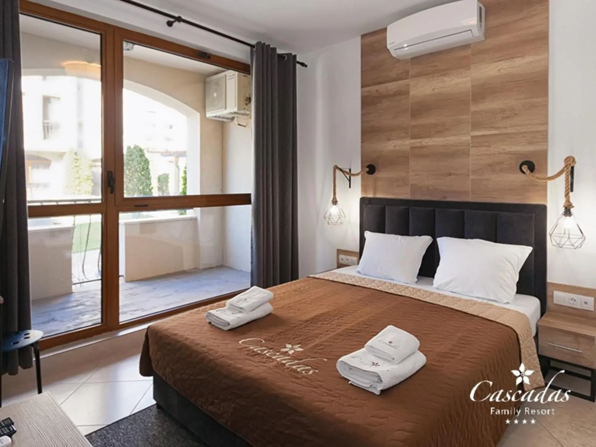 Bed in Cascadas Family Resort