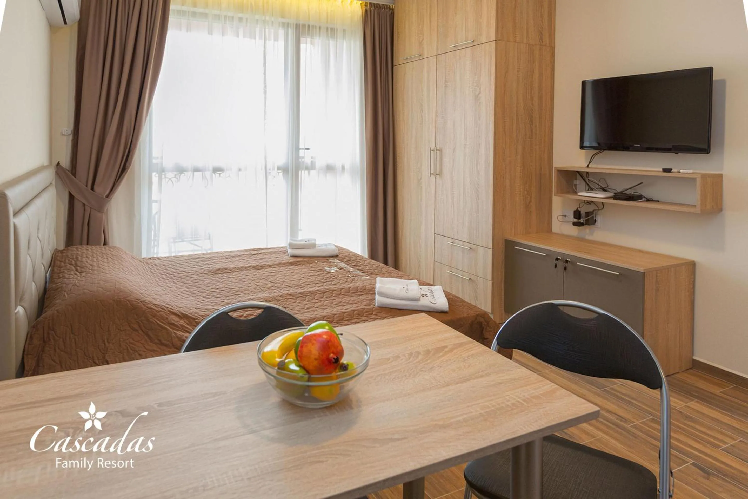 Bed in Cascadas Family Resort