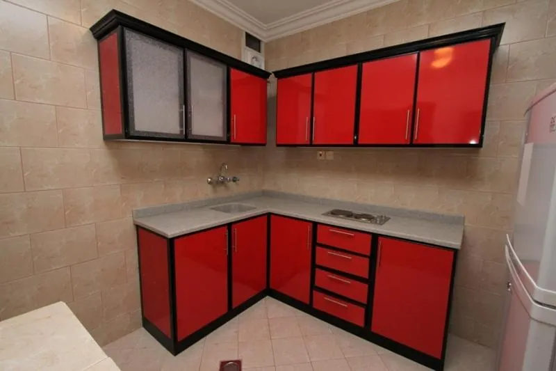 Kitchen or kitchenette in Raoum Inn Majmaa