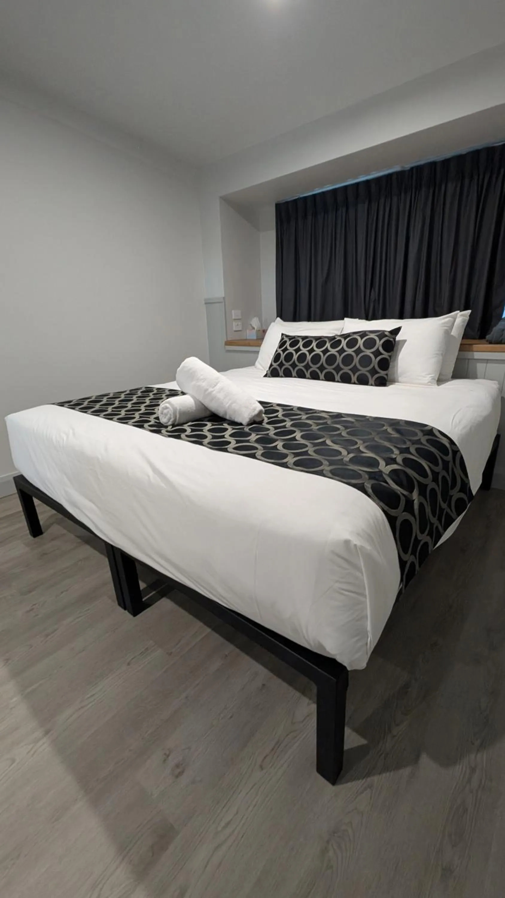 Bed in Cooma High Country Motel