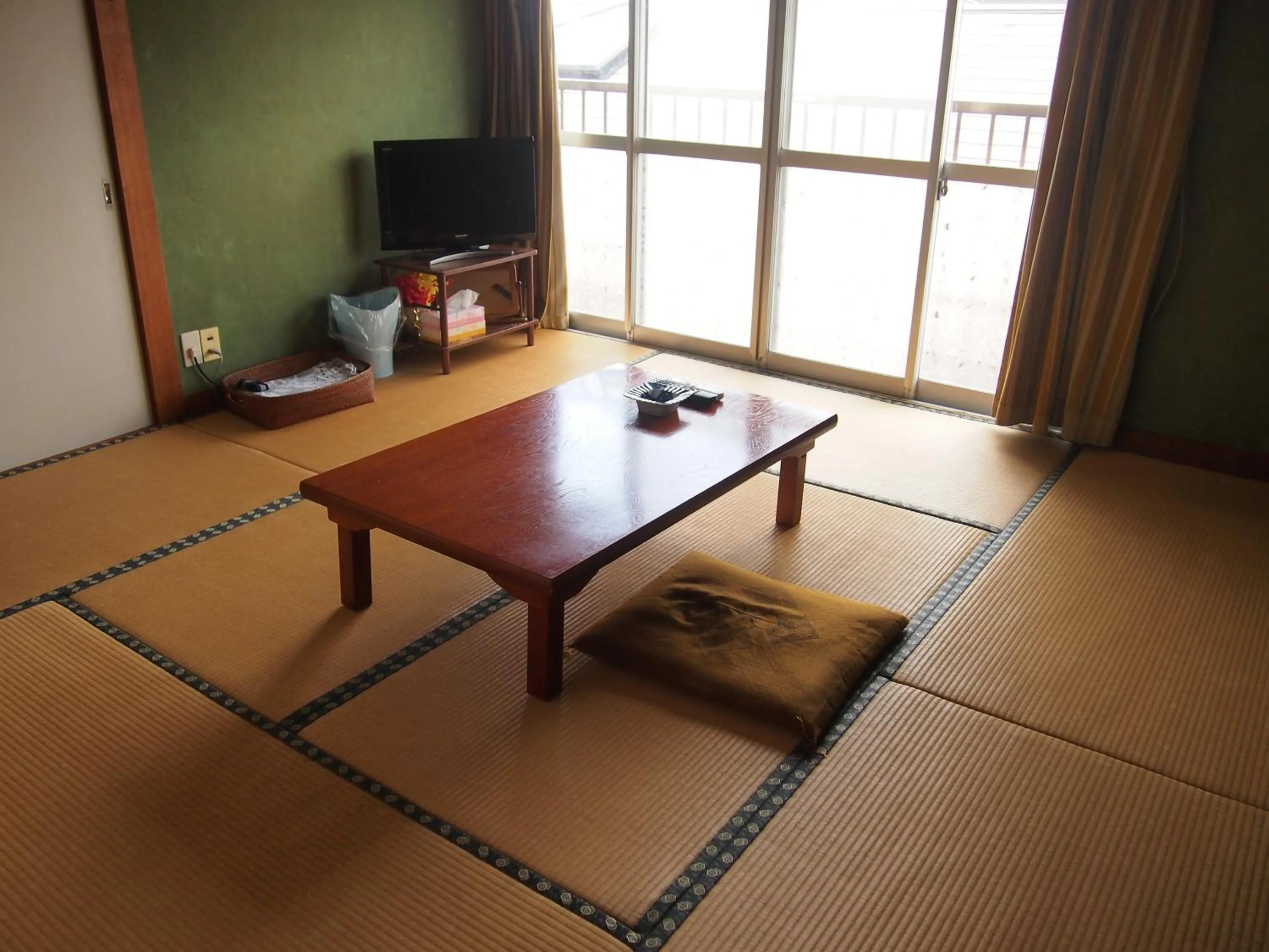 Photo of the whole room in Family Ryokan Kawakyu with Showa Retro, private hot spring