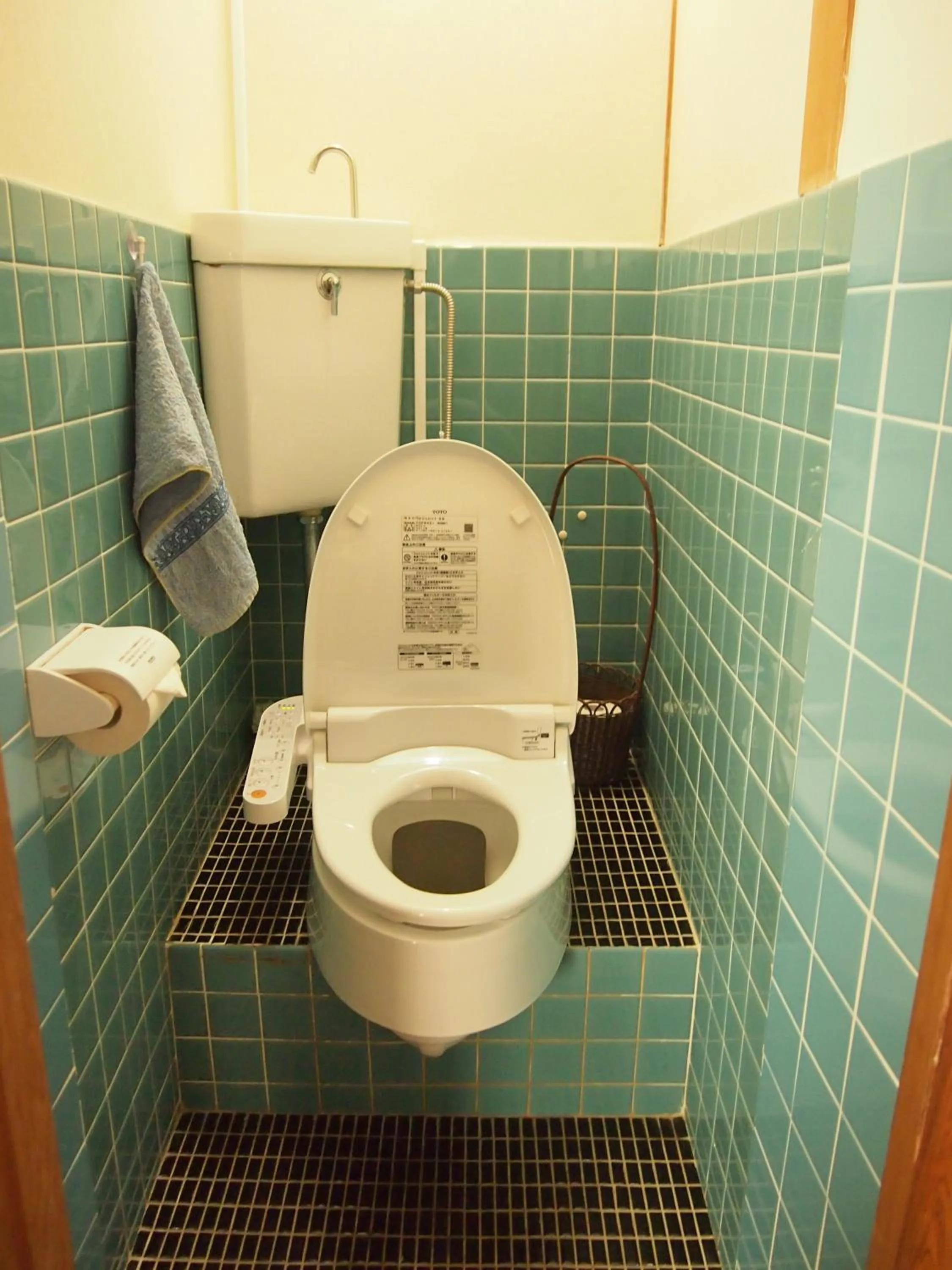 Toilet in Family Ryokan Kawakyu with Showa Retro, private hot spring