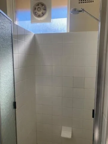 Shower in Ultimate Apartments Bondi Beach