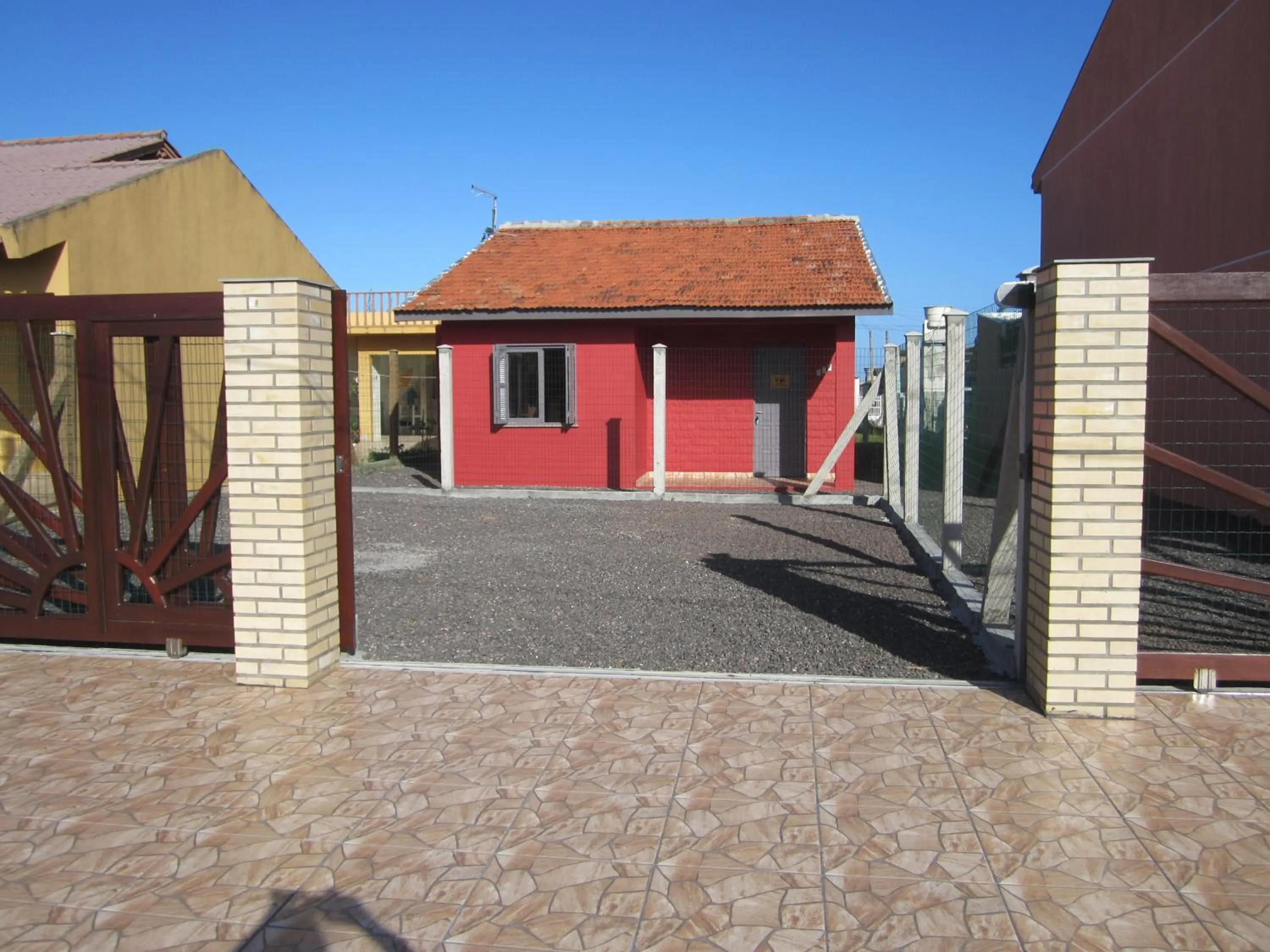 Facade/entrance in Oasis Sul Tramandaí Casa Vermelha