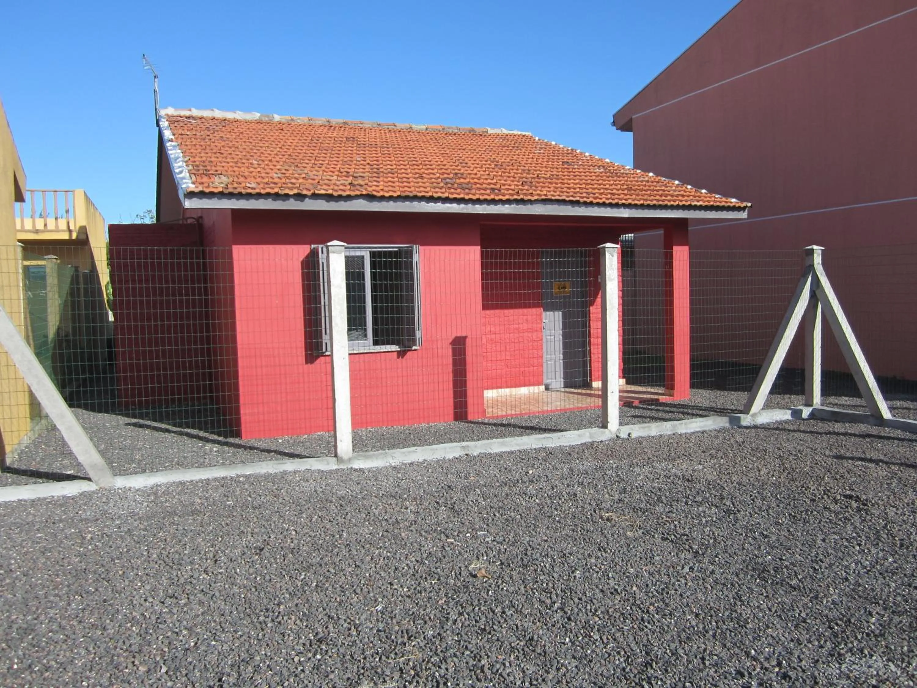 Facade/entrance in Oasis Sul Tramandaí Casa Vermelha