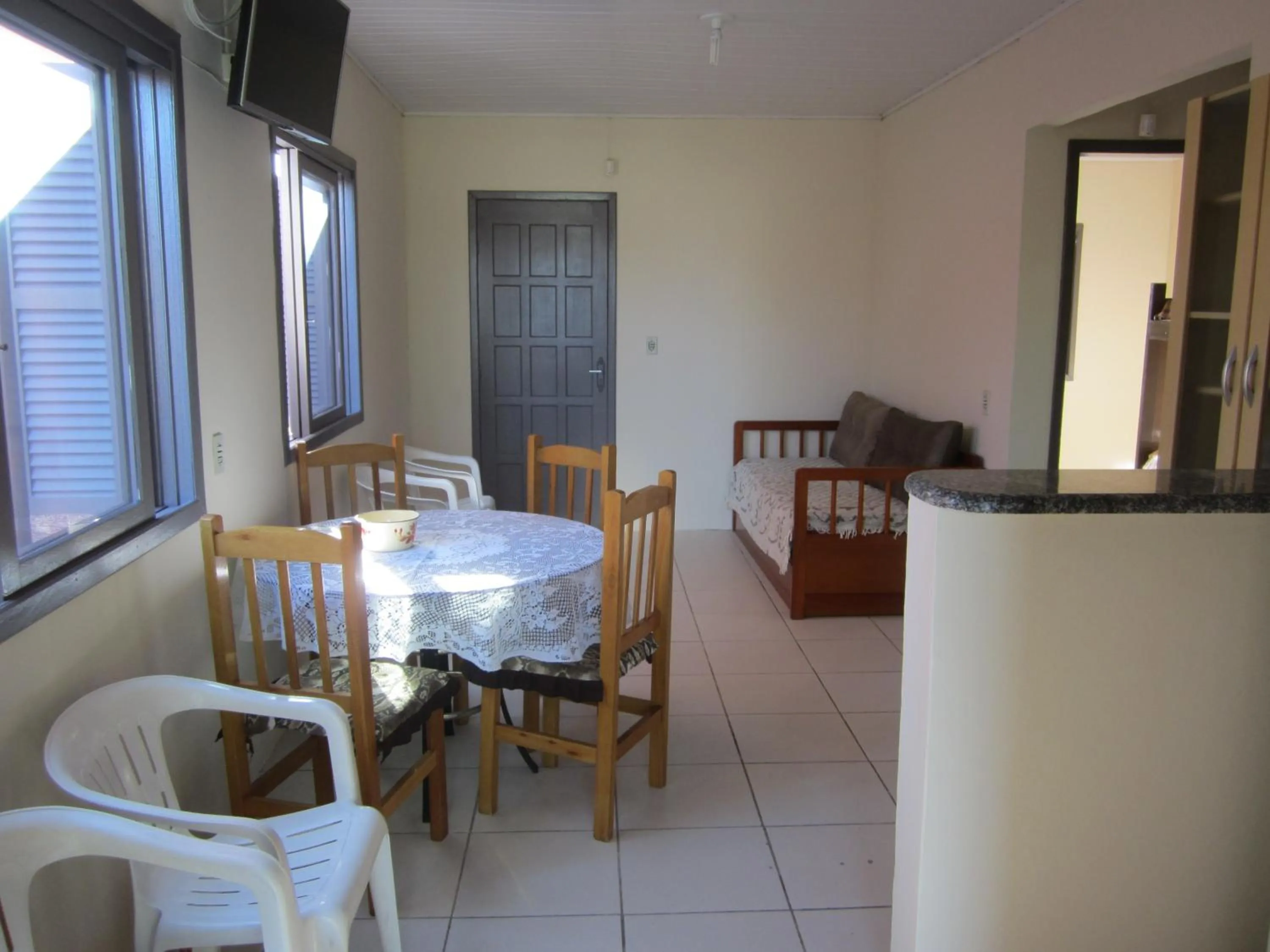 Communal kitchen in Oasis Sul Tramandaí Casa Vermelha