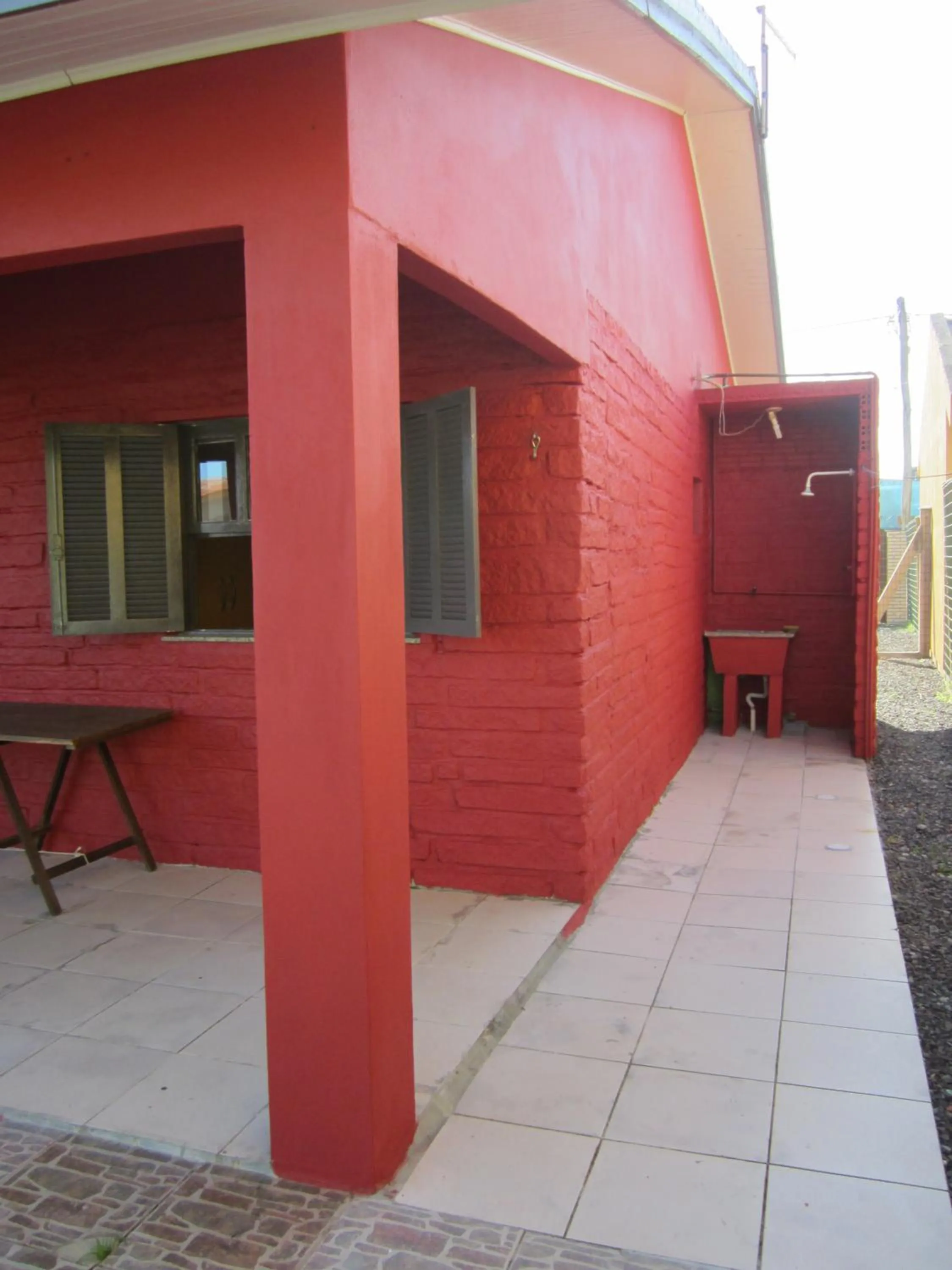 Property building in Oasis Sul Tramandaí Casa Vermelha