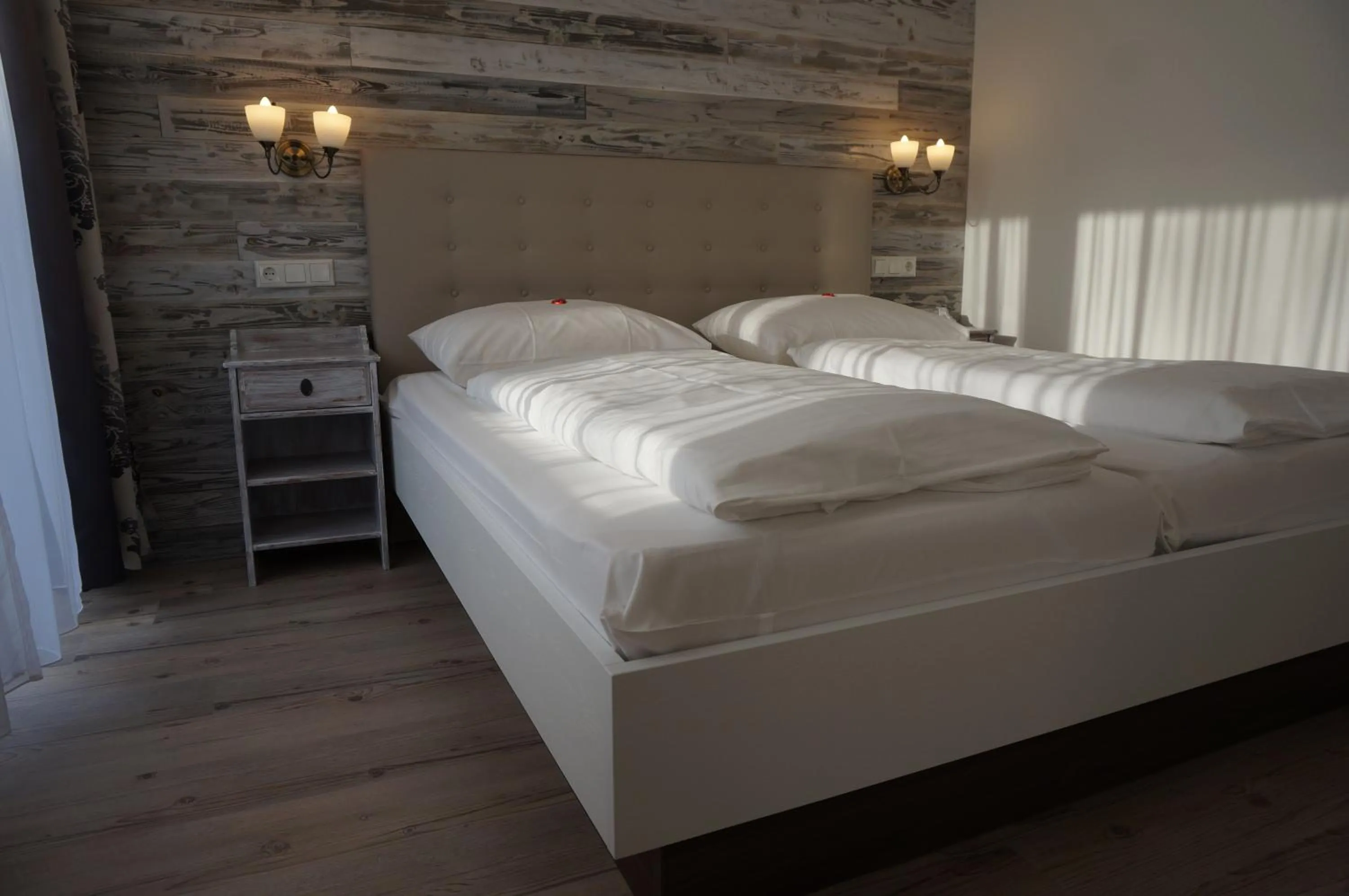 Decorative detail, Bed in Hotel Diana Garni