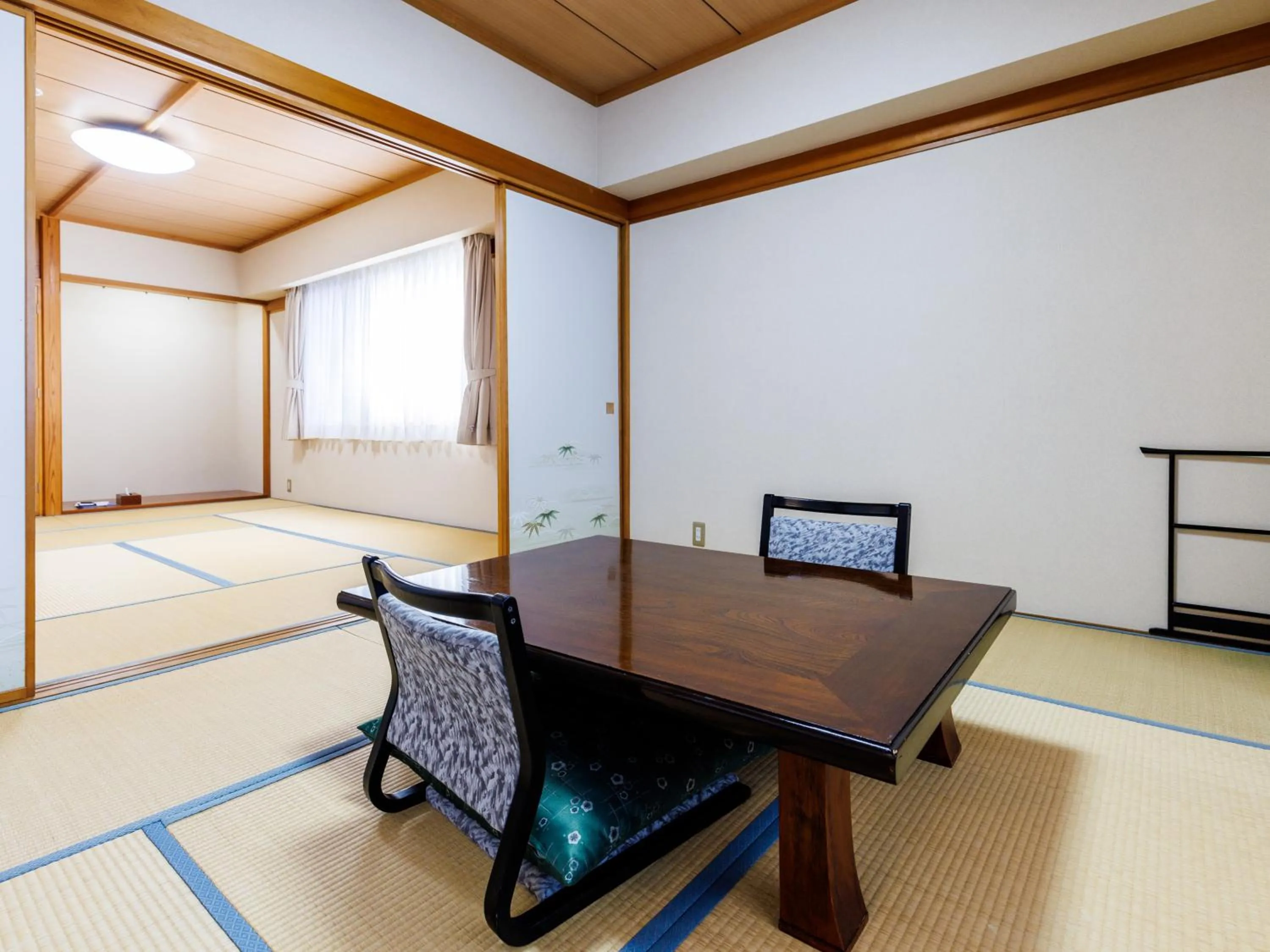 Bed in Tabist Hotel Nemuro Kaiyoutei