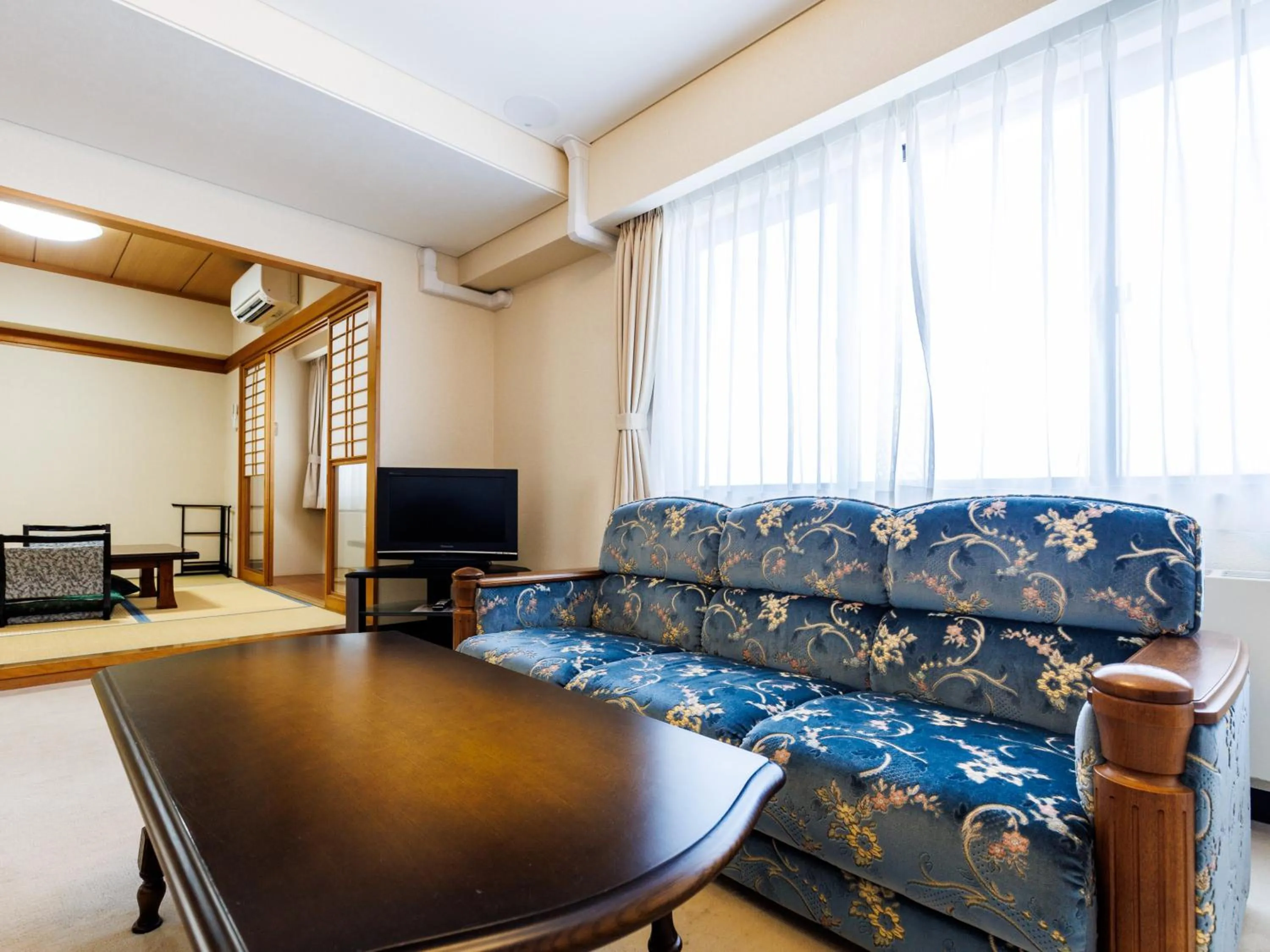 Bed in Tabist Hotel Nemuro Kaiyoutei