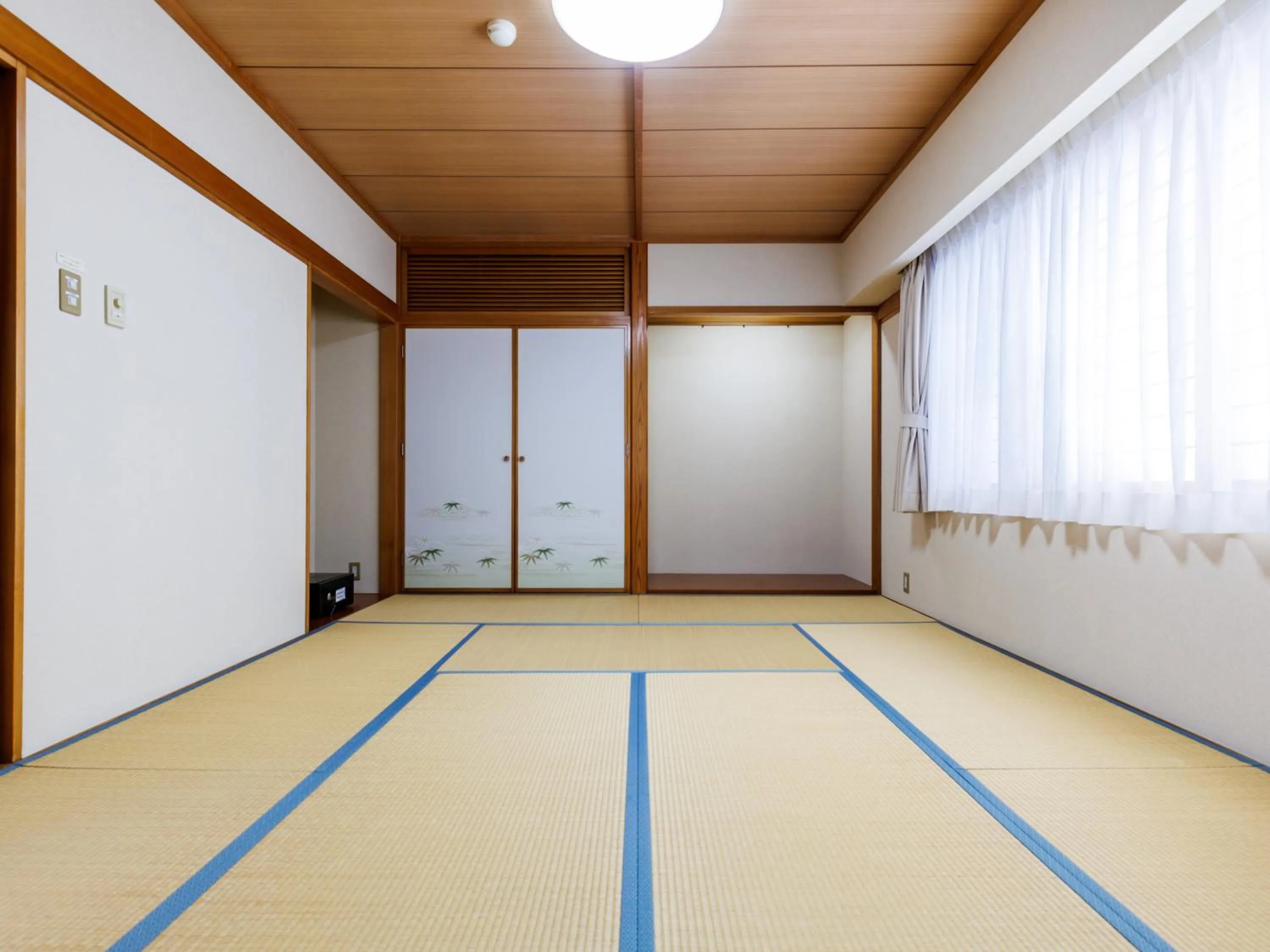 Bed in Tabist Hotel Nemuro Kaiyoutei