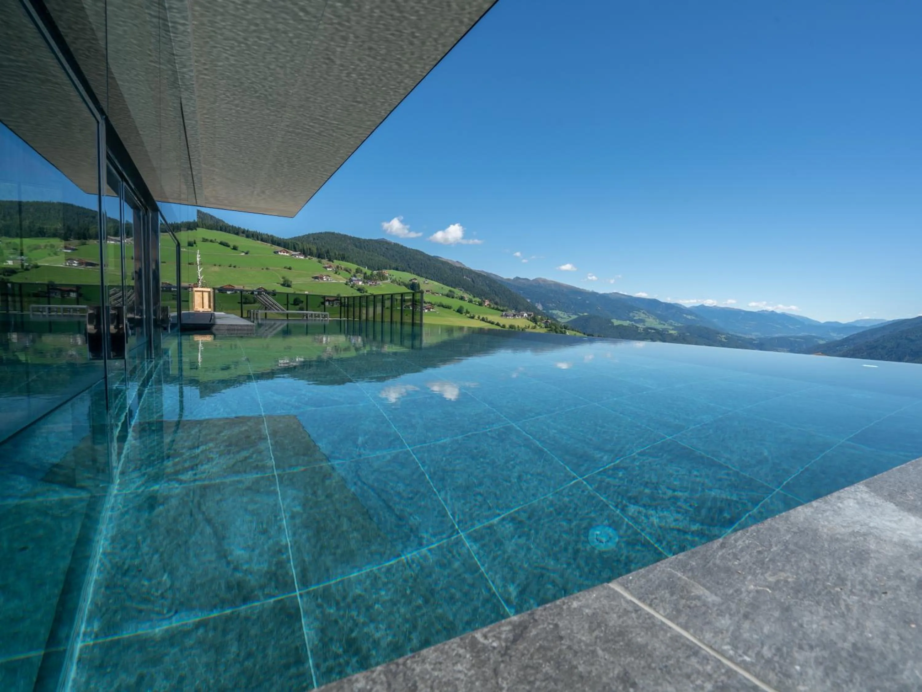 Swimming pool in Hotel Purvita by Oberlechner
