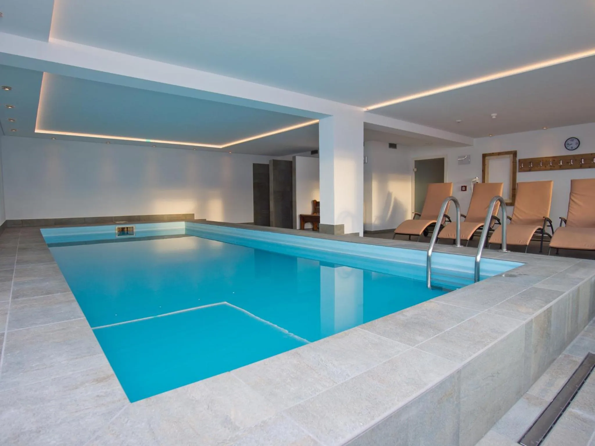 Swimming pool in Hotel Purvita by Oberlechner