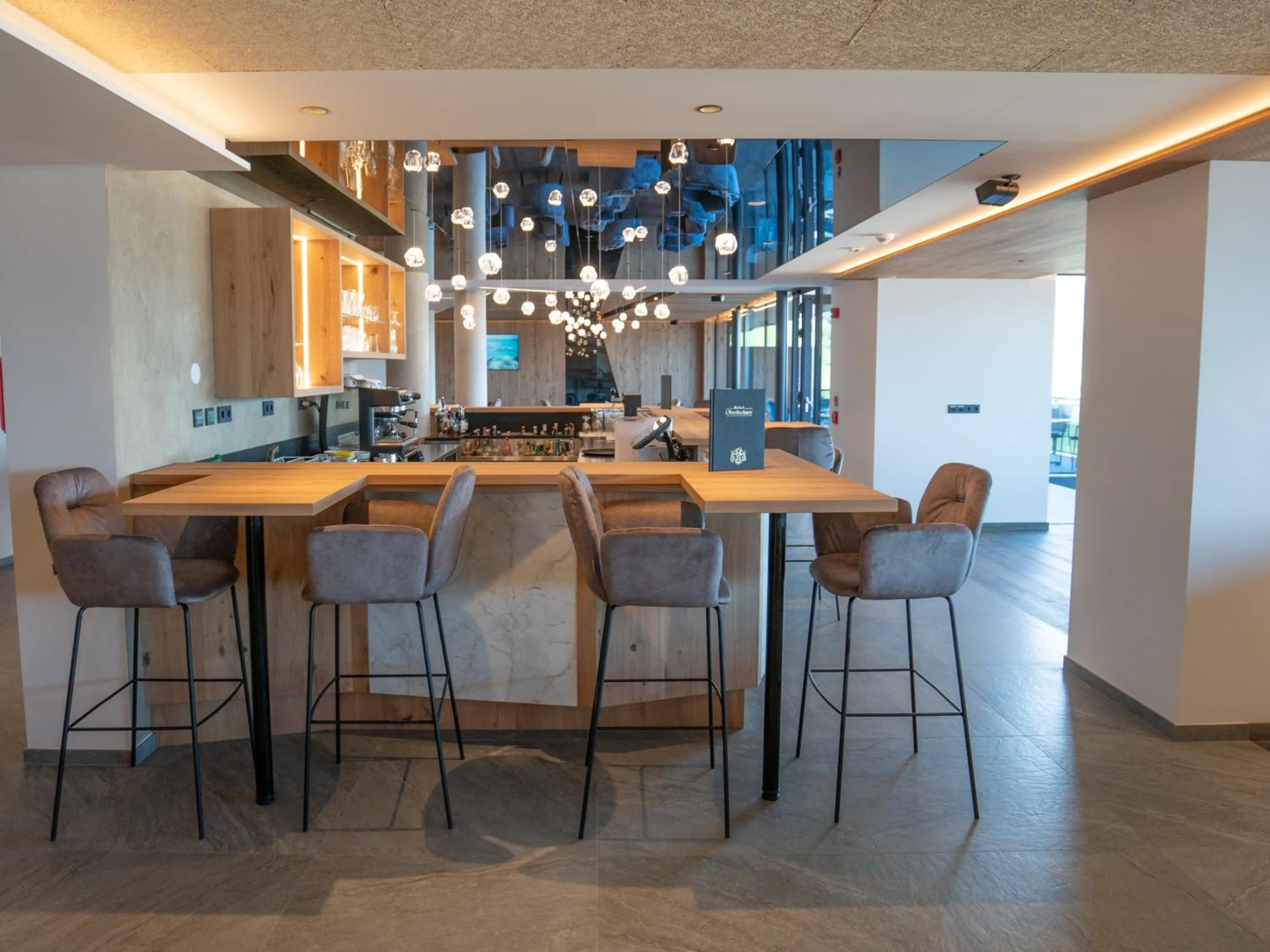 Lounge or bar in Hotel Purvita by Oberlechner