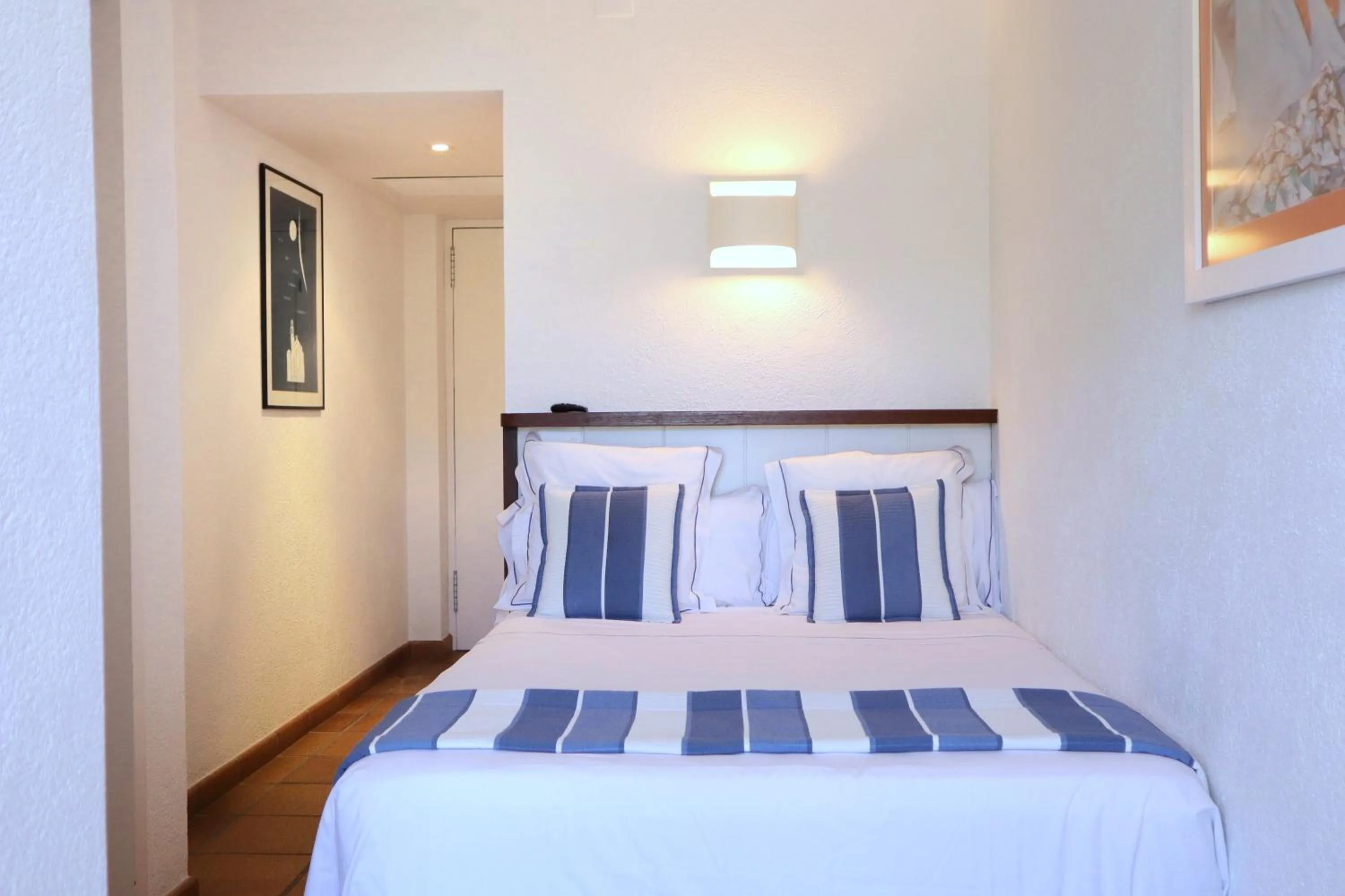Bed in Hotel Blaumar Cadaqués by Fimedhotels