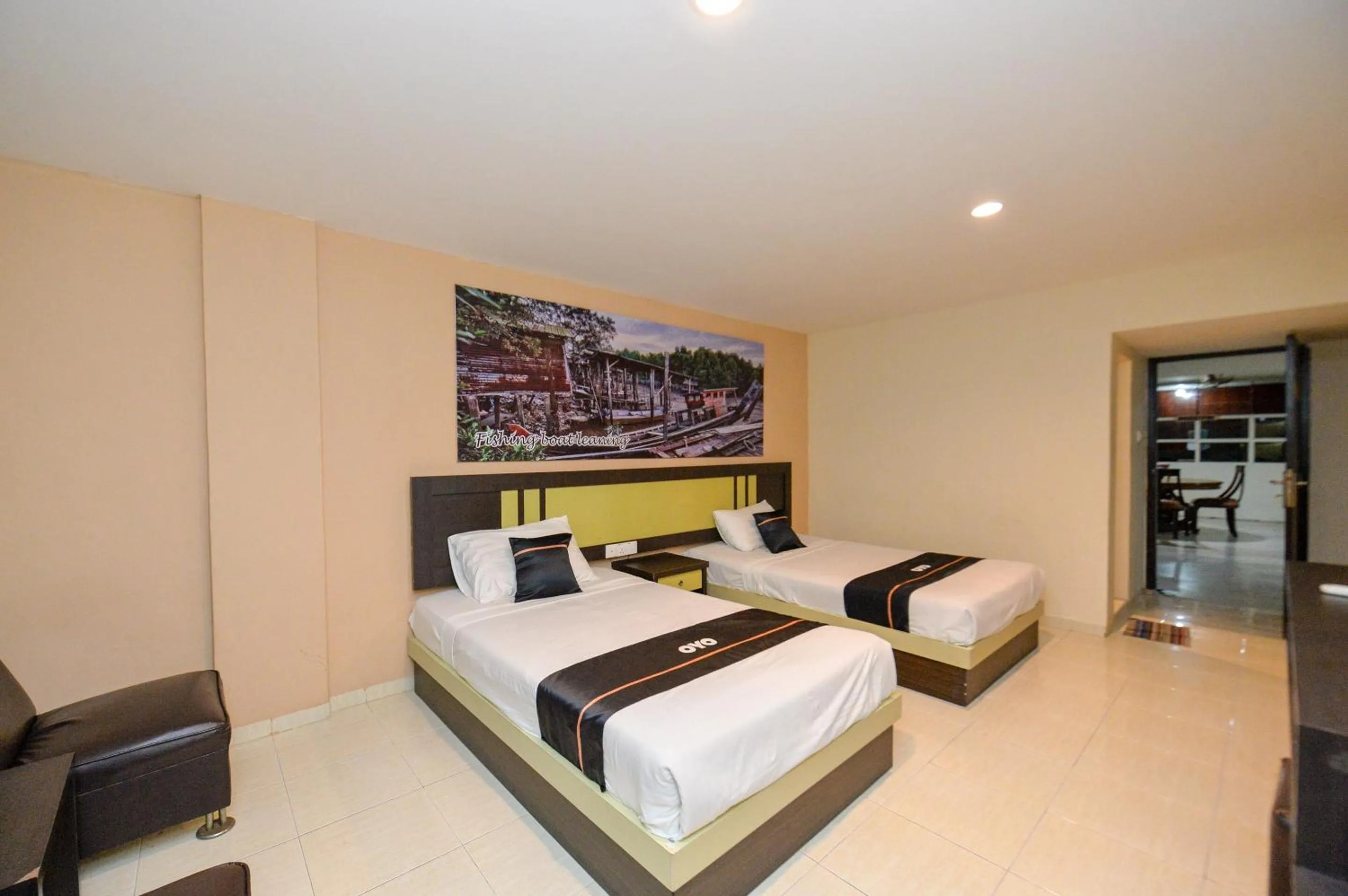 Bedroom in OYO 2487 Sampurna Jaya Hotel