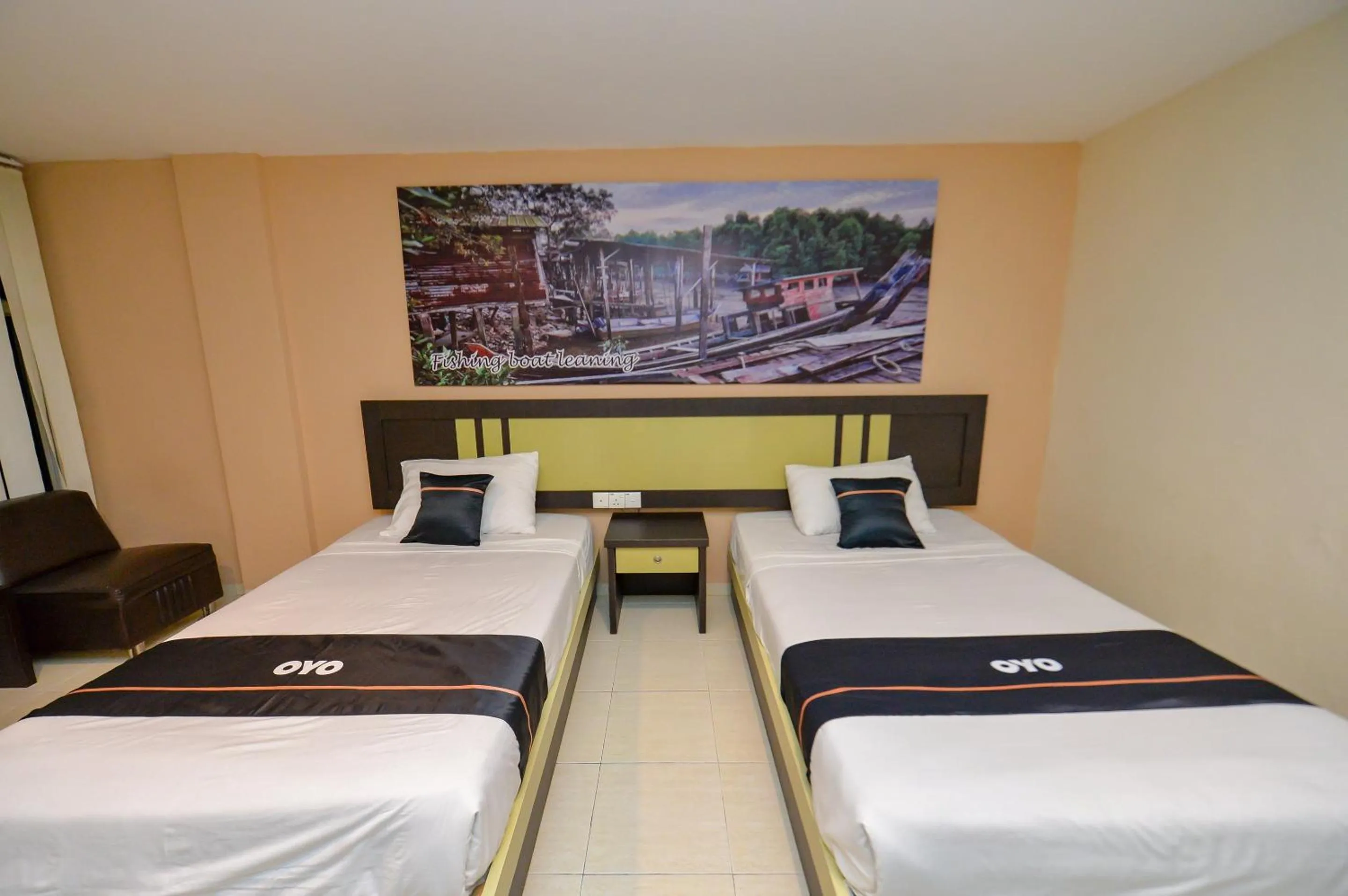 Bedroom in OYO 2487 Sampurna Jaya Hotel