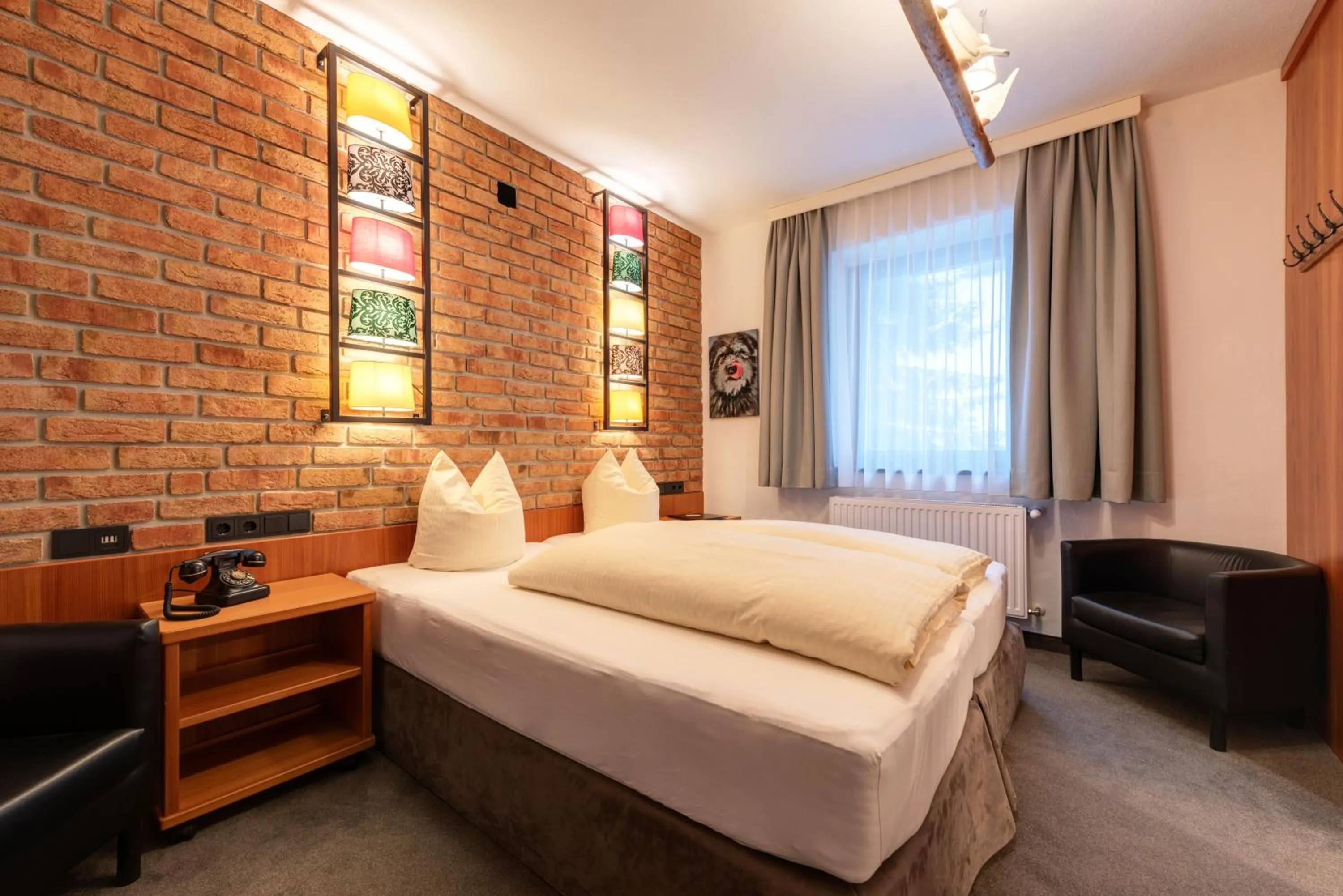 Photo of the whole room, Bed in Hotel Pension Kirchplatz