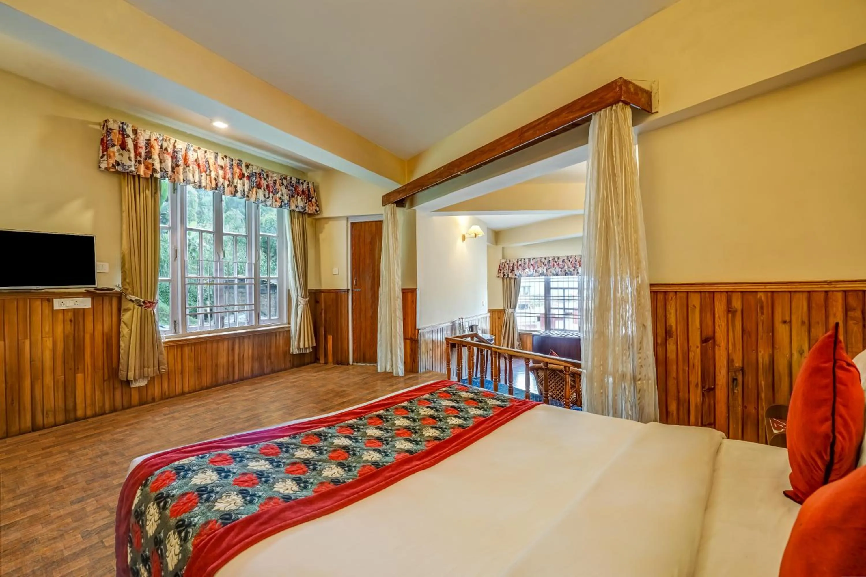 Bed in Summit Newa Regency